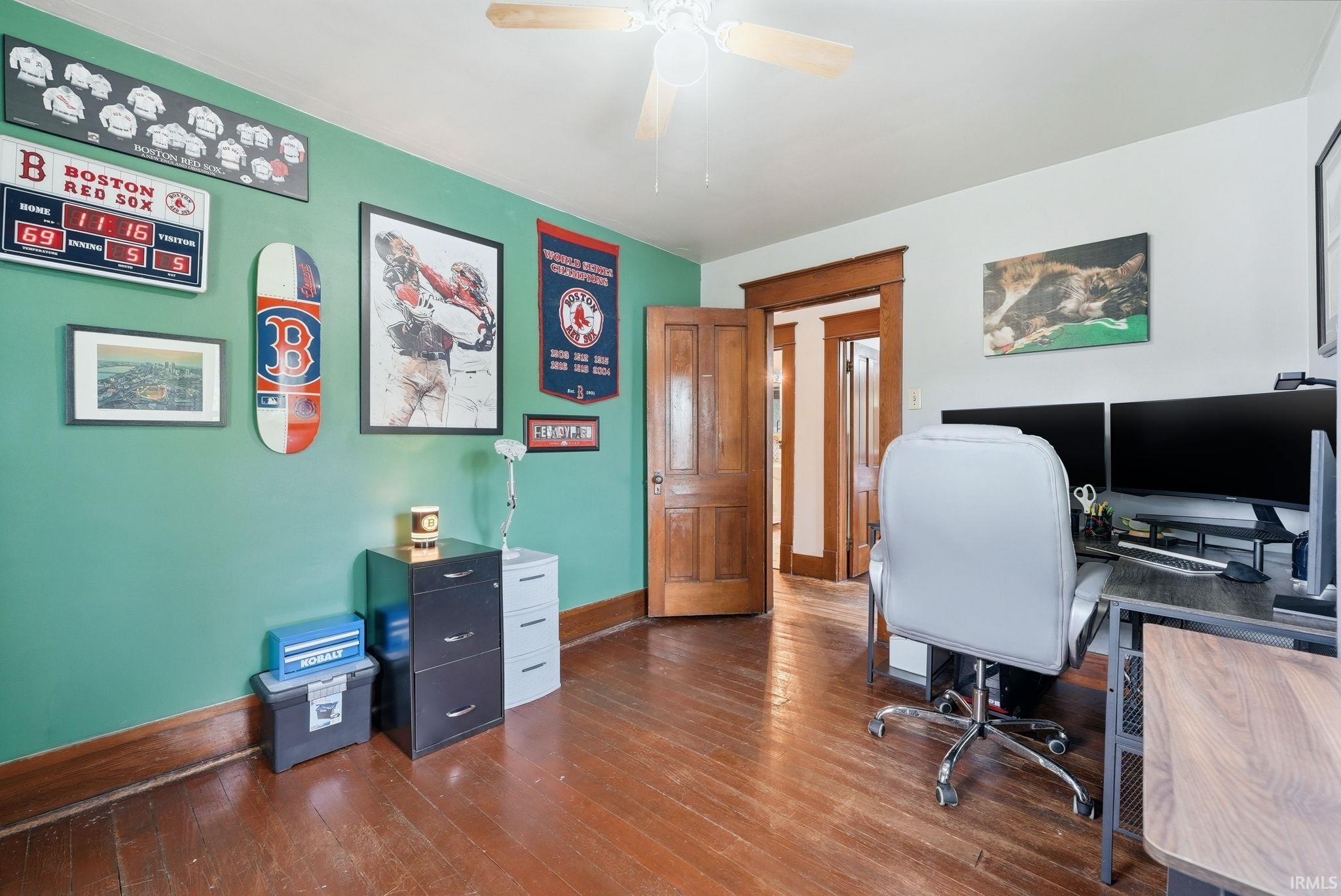 Wood-finish flooring with a ceiling fan