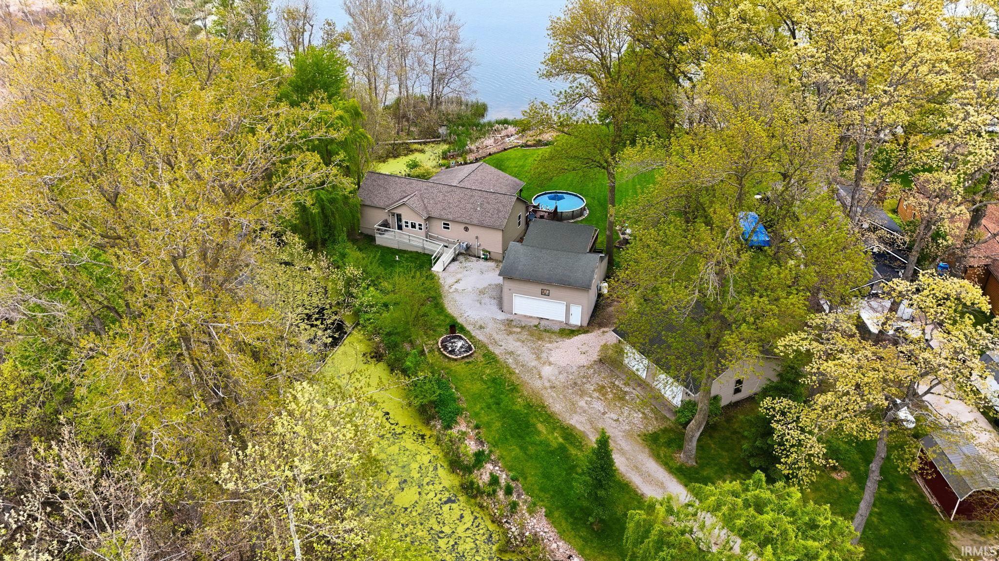 1st image of 10105 N Eagle Island Rd, Rome City, IN 46784 | MLS# 202618240