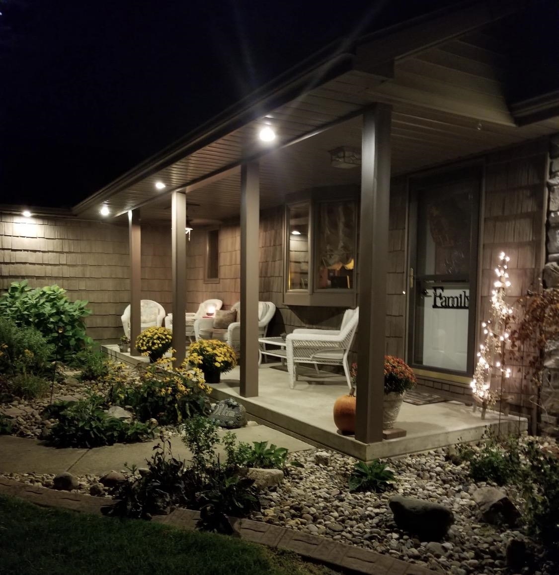 Covered concrete front porch featuring recessed lighting