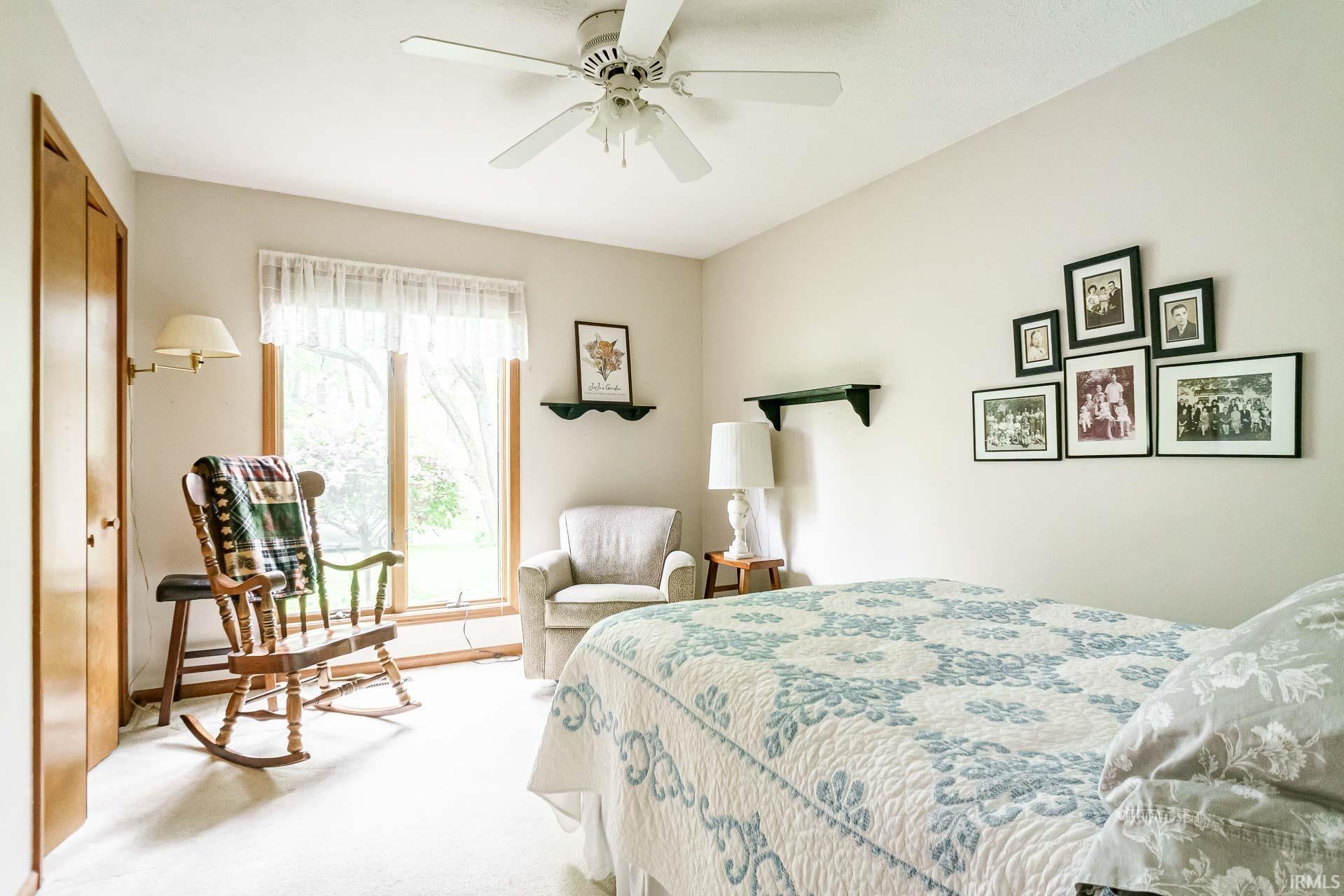 Natural light filters through a large window, illuminating light-toned walls