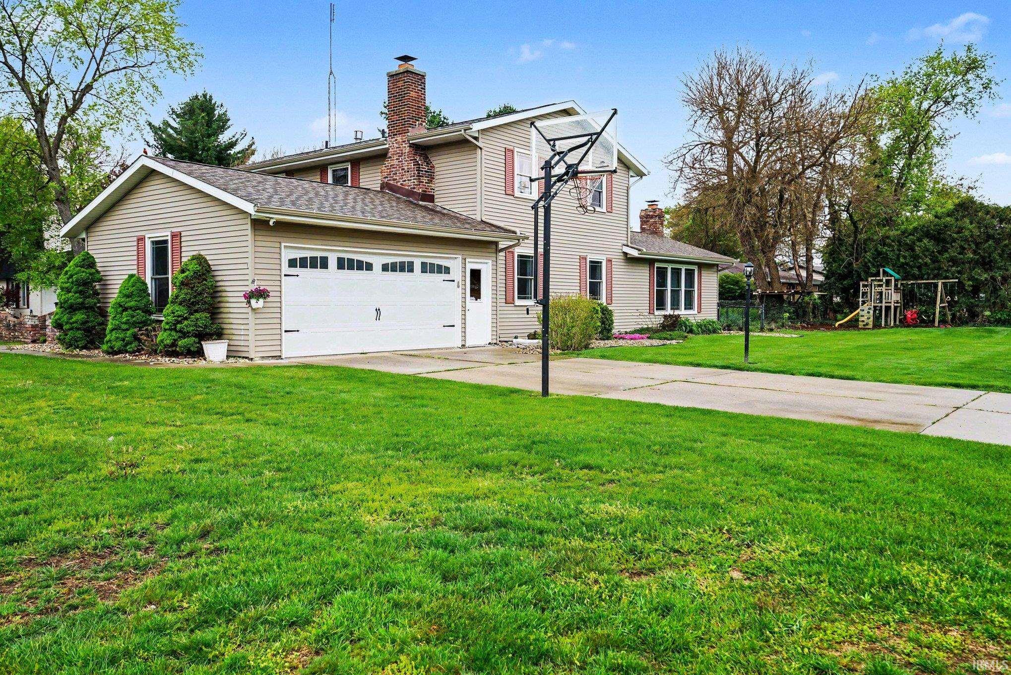 Two-car garage with white paneled door