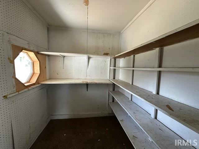 Built-in shelving with multiple storage tiers
