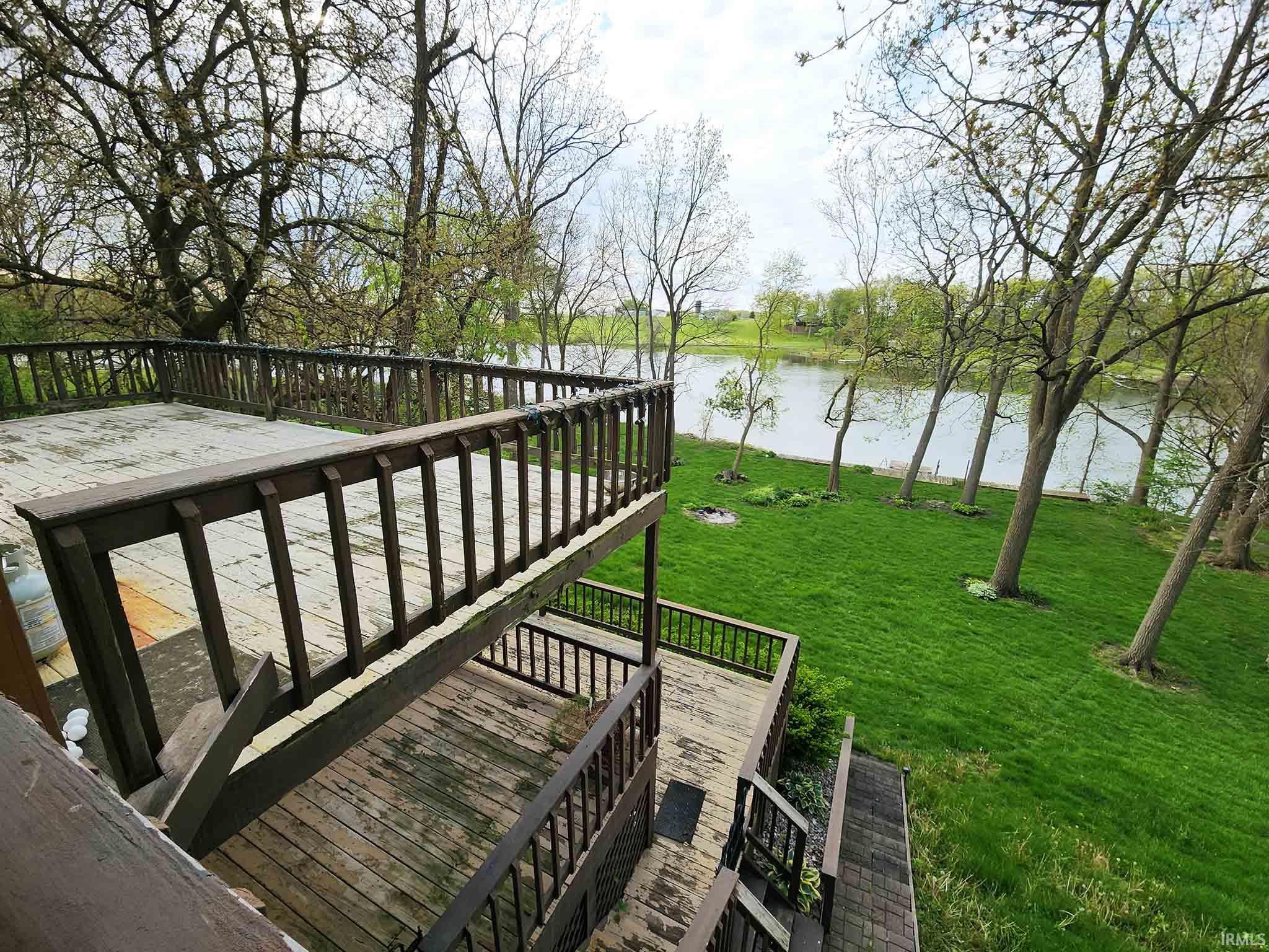 Three-level lakeside deck toward lake.