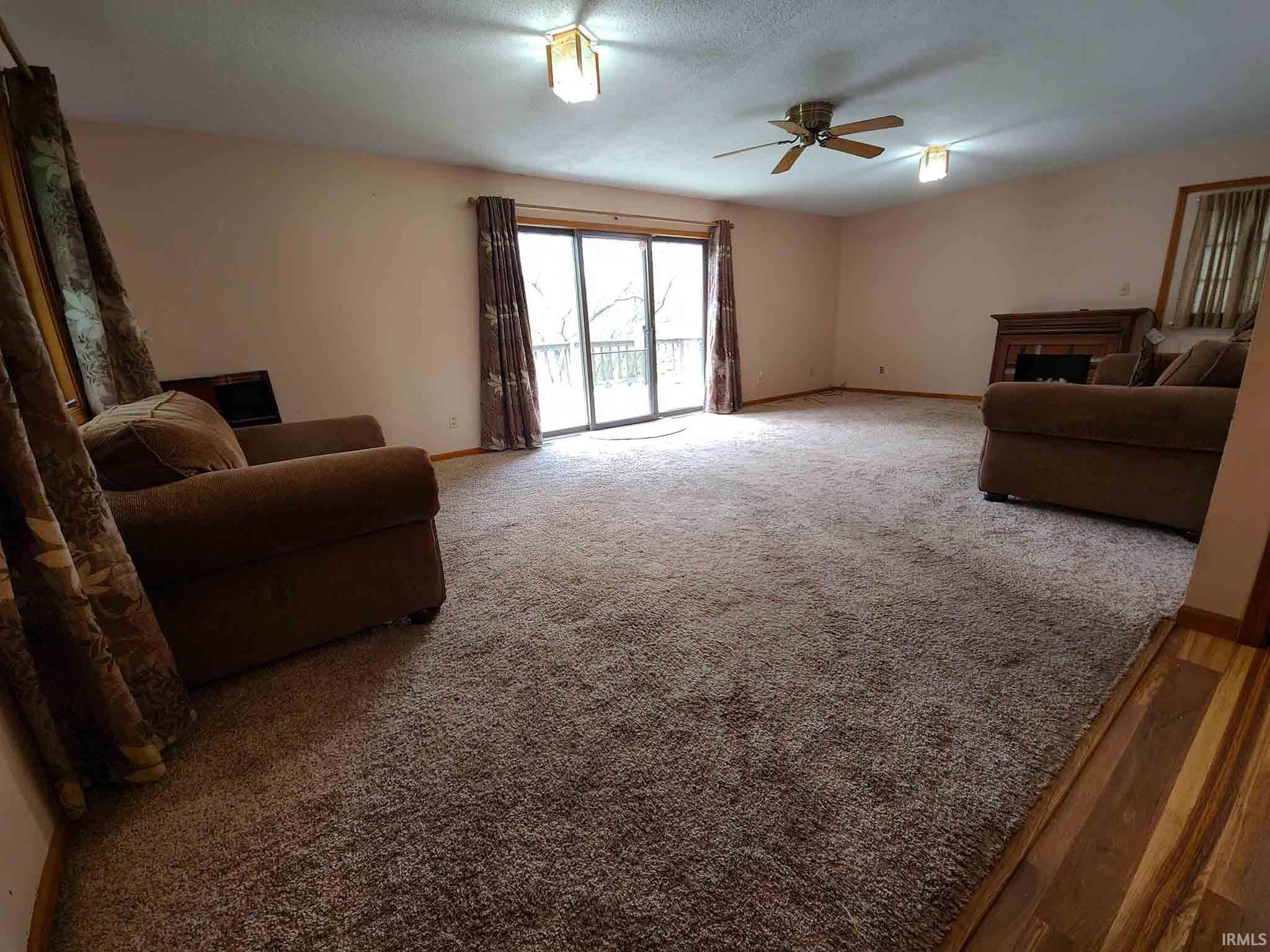 Living room from entry toward lakeside deck.