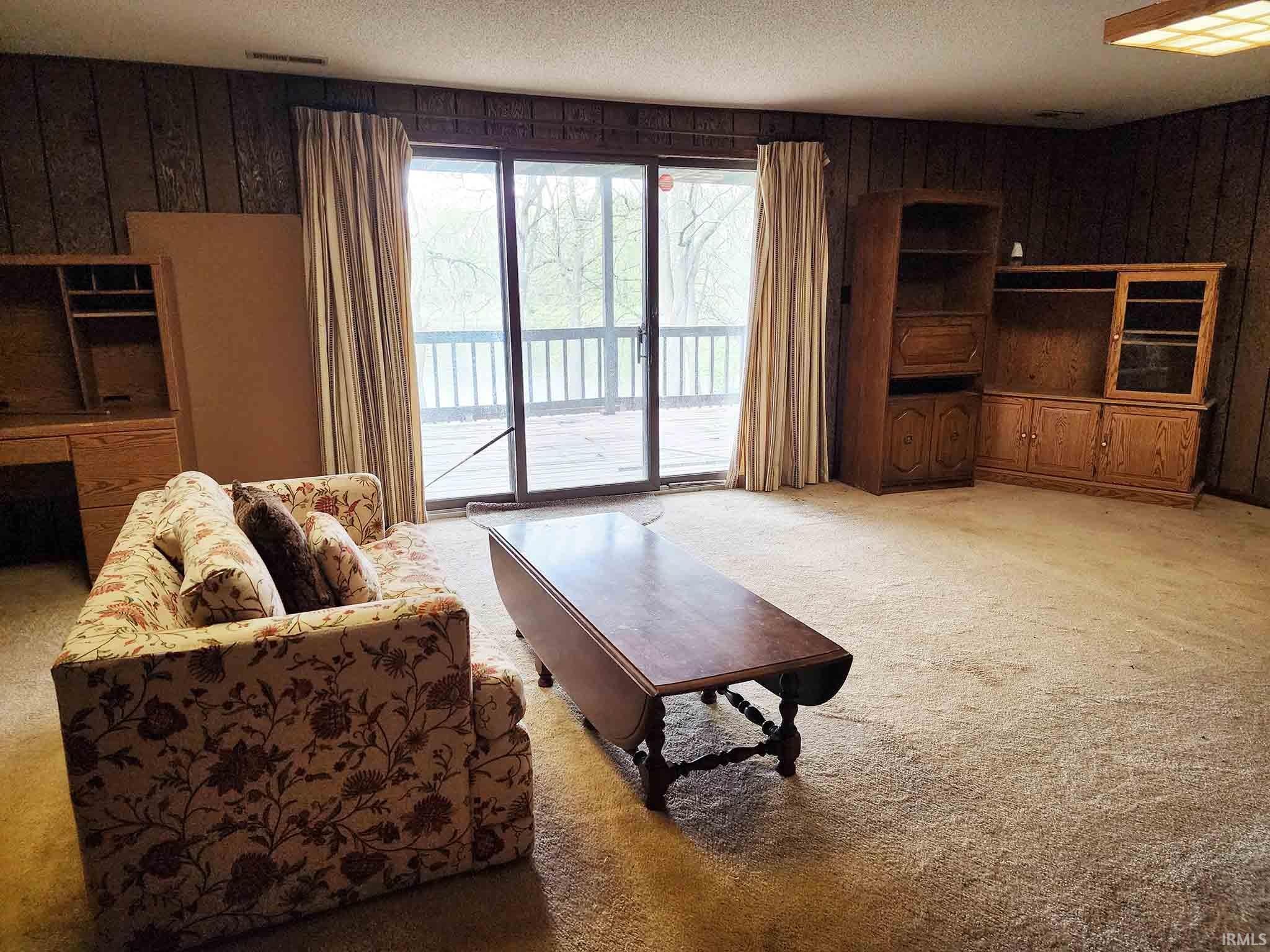 Lower level walkout family room toward deck.