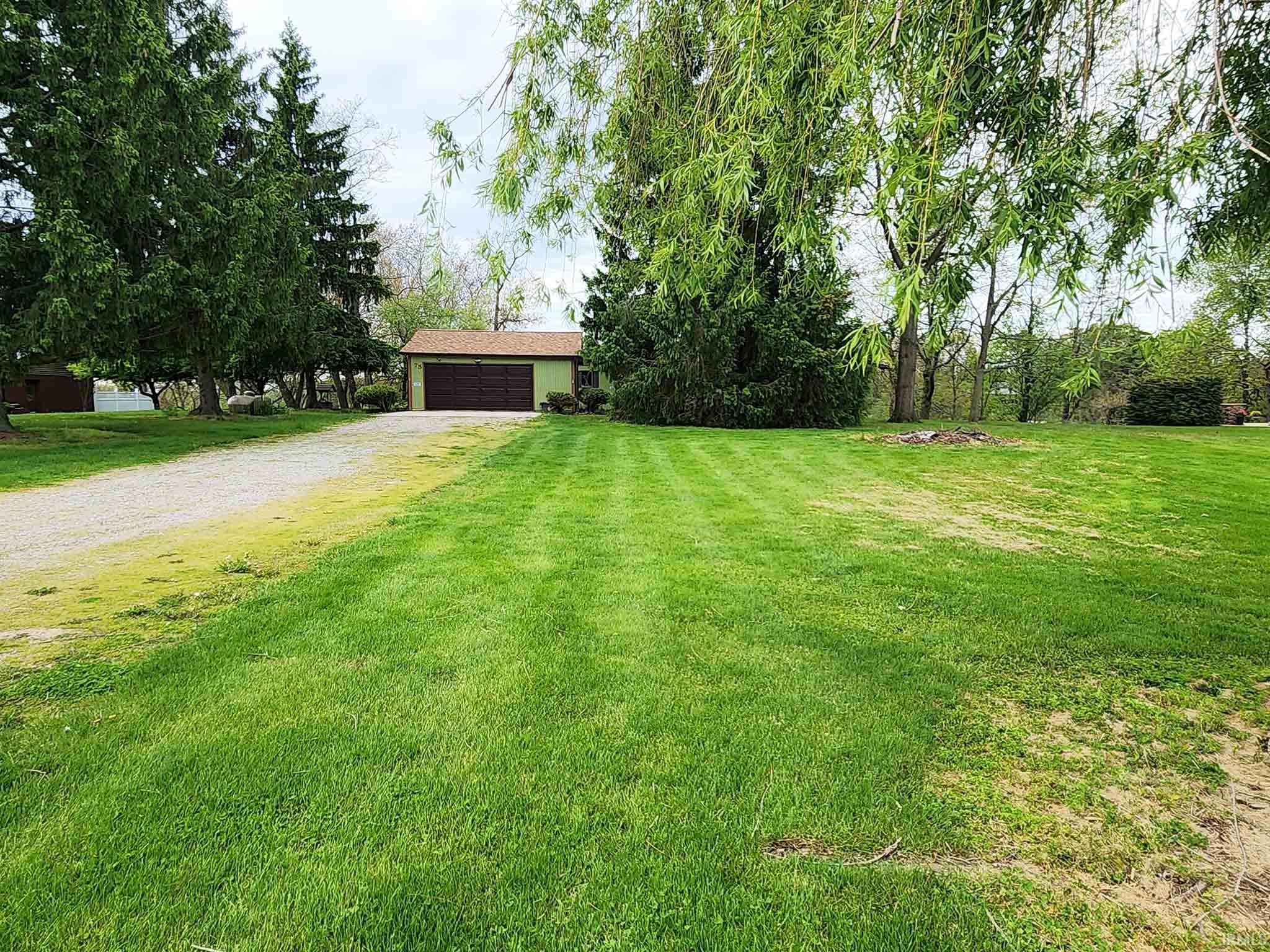 View of home and garage from street.