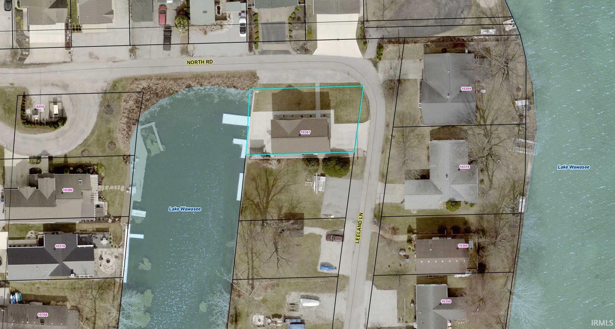 Plat Map. Illustrating the property's boundary and surrounding parcels in relation to Lake Wawasee