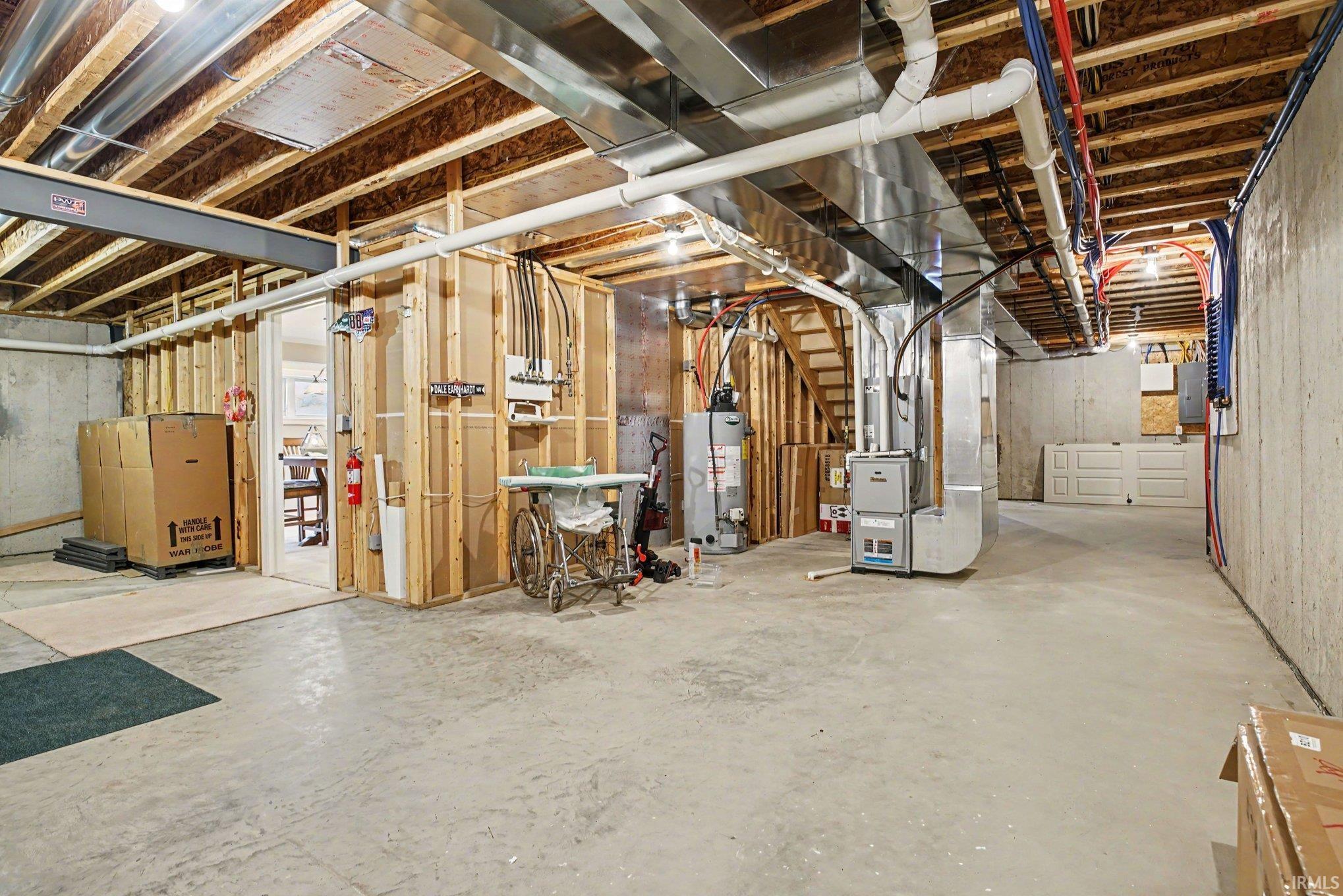 Unfinished basement offering expansive concrete flooring