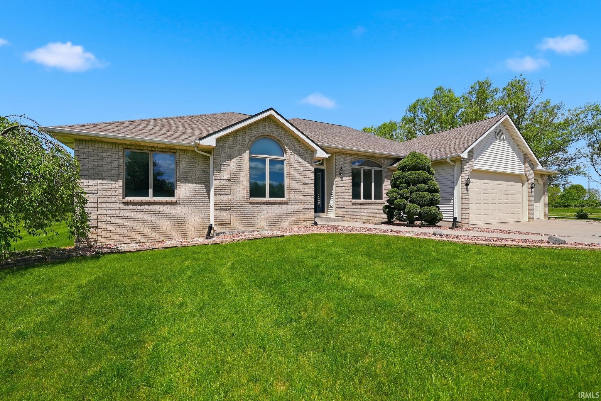 Brick exterior with arched window accents