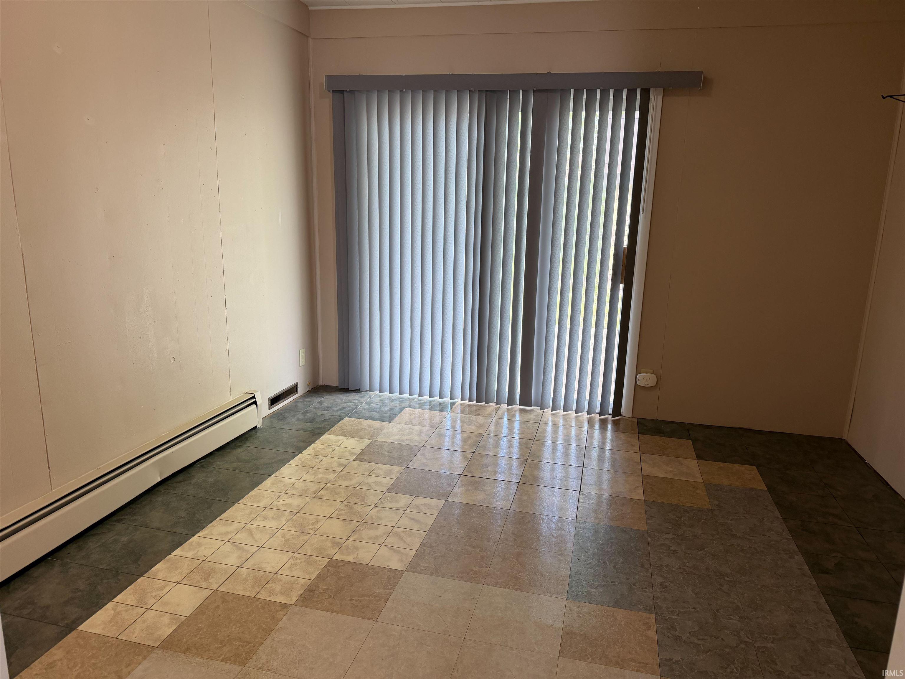Sliding glass door with vertical blinds