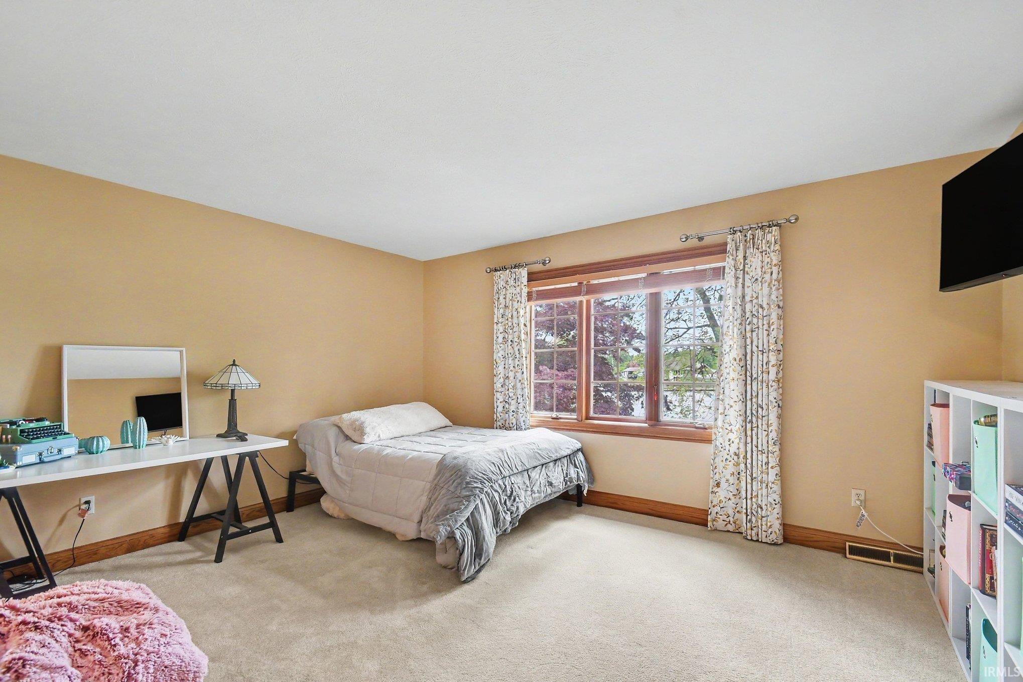 Large Bedroom Featuring River Views and Large ensuite.