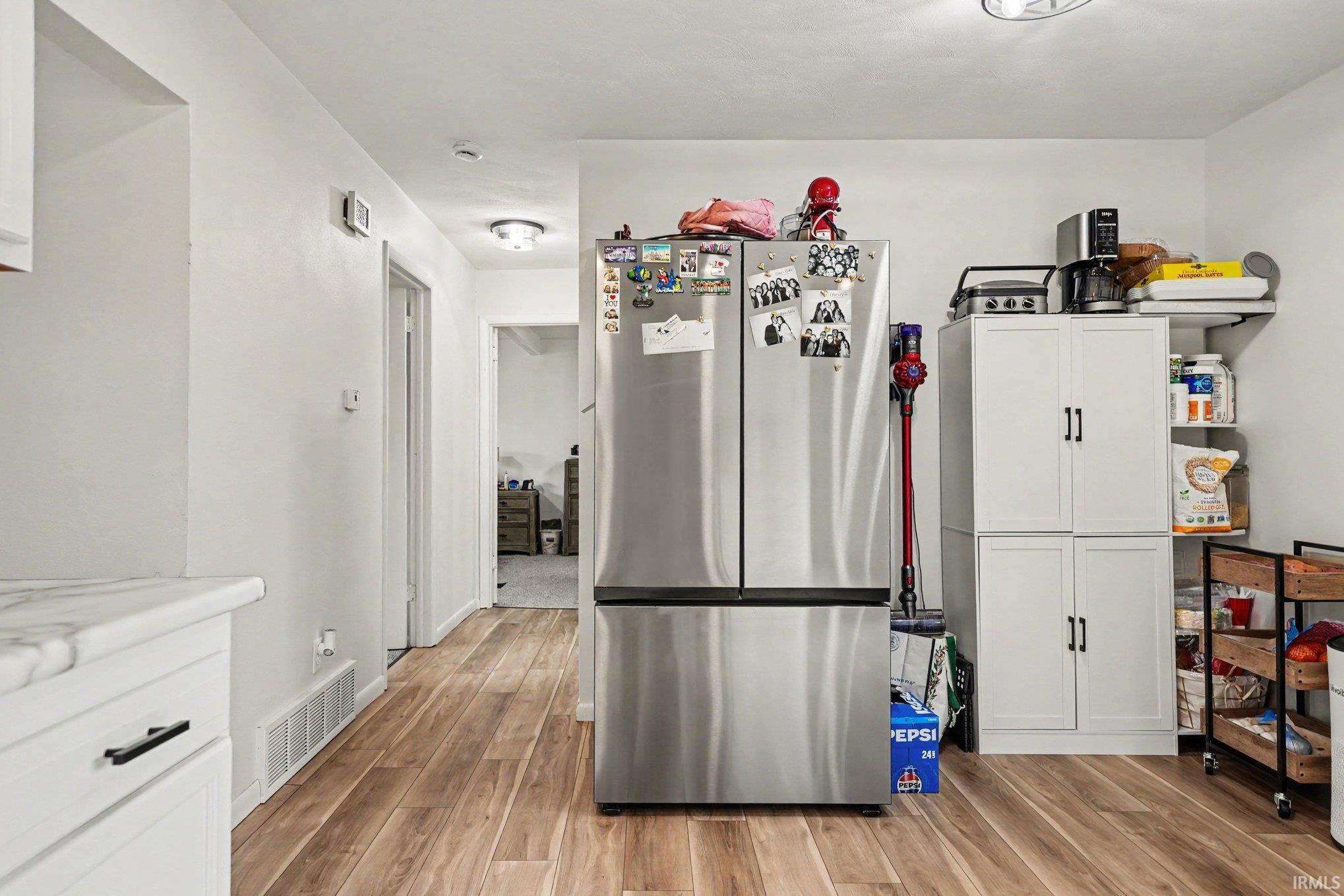 Wood-finish flooring throughout