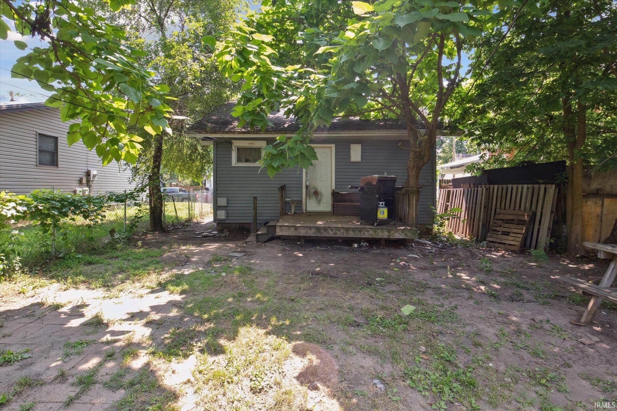 Rear exterior with gray siding