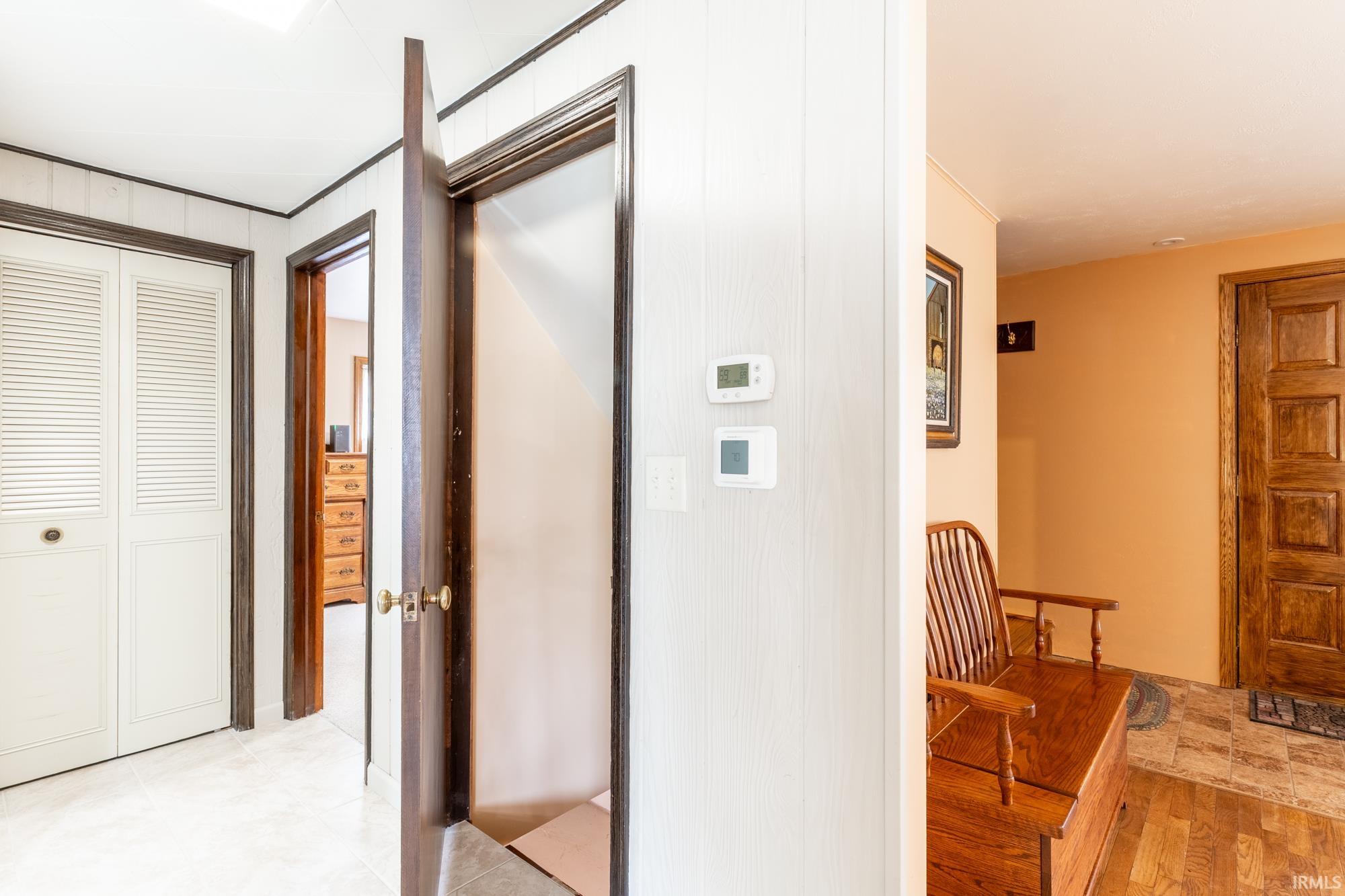 White paneled walls with dark trim detail