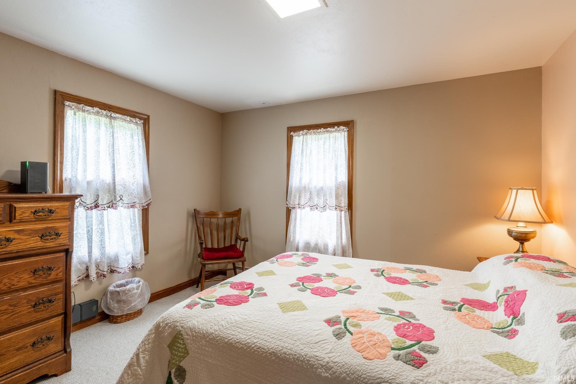 Northwest facing bedroom with large cedar lined closet on main level