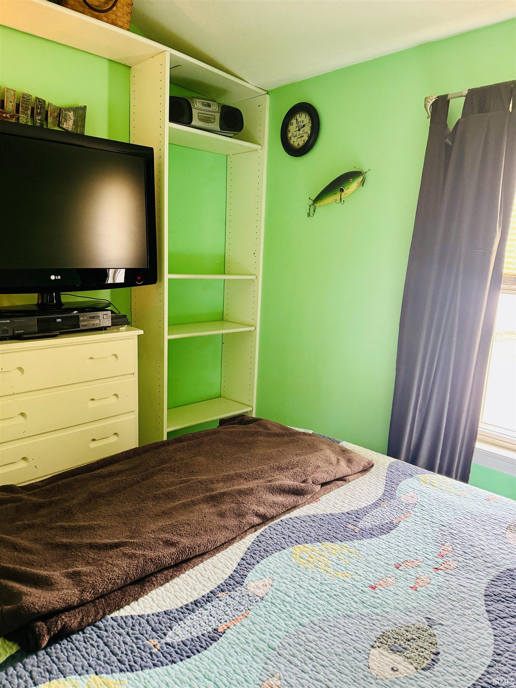 Built-in shelving unit providing storage