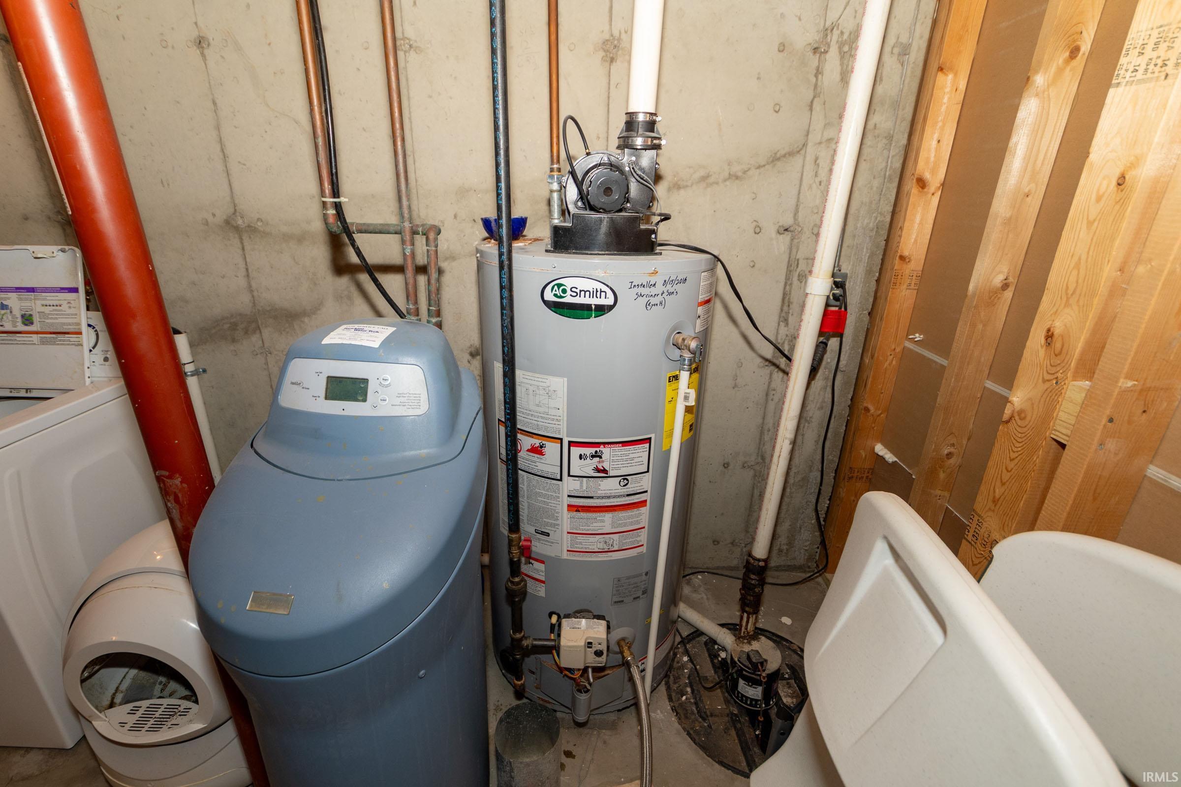 Water softener system and hot water heater present