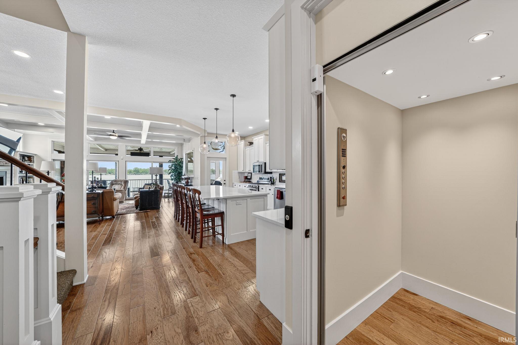 Integrated elevator access with recessed lighting