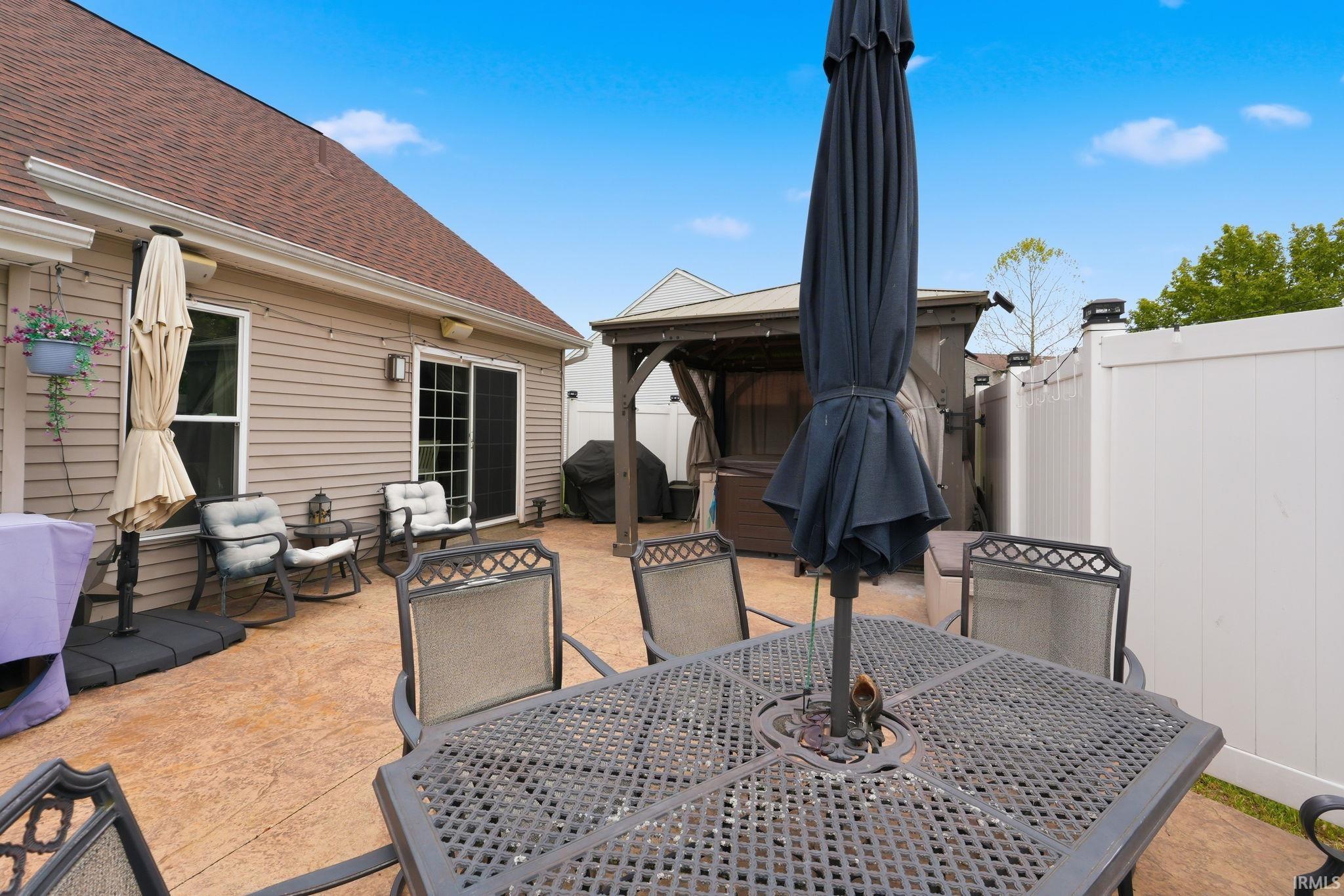 Stamped concrete patio providing an outdoor living area