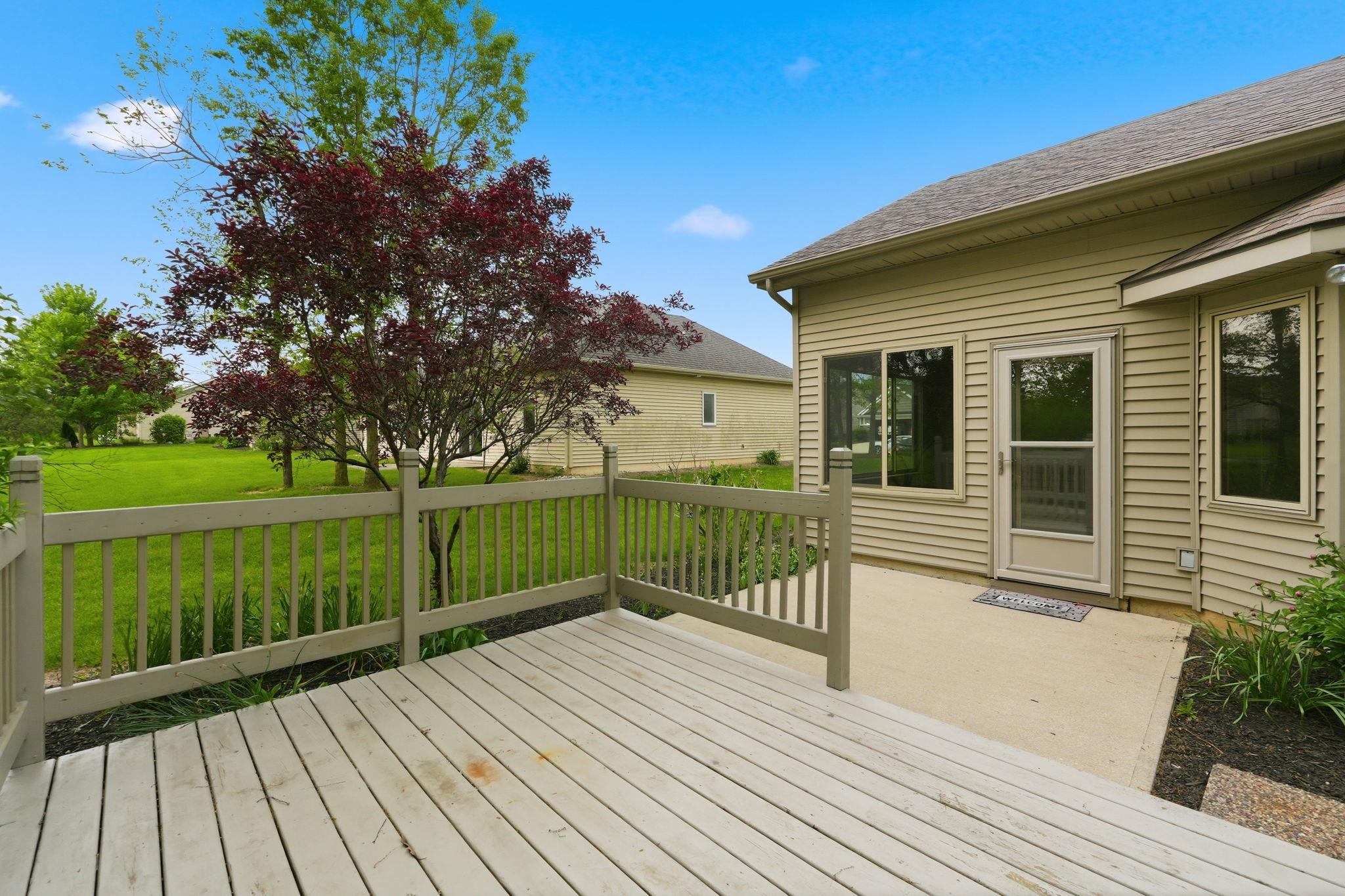 Expansive outdoor deck with a complementary patio