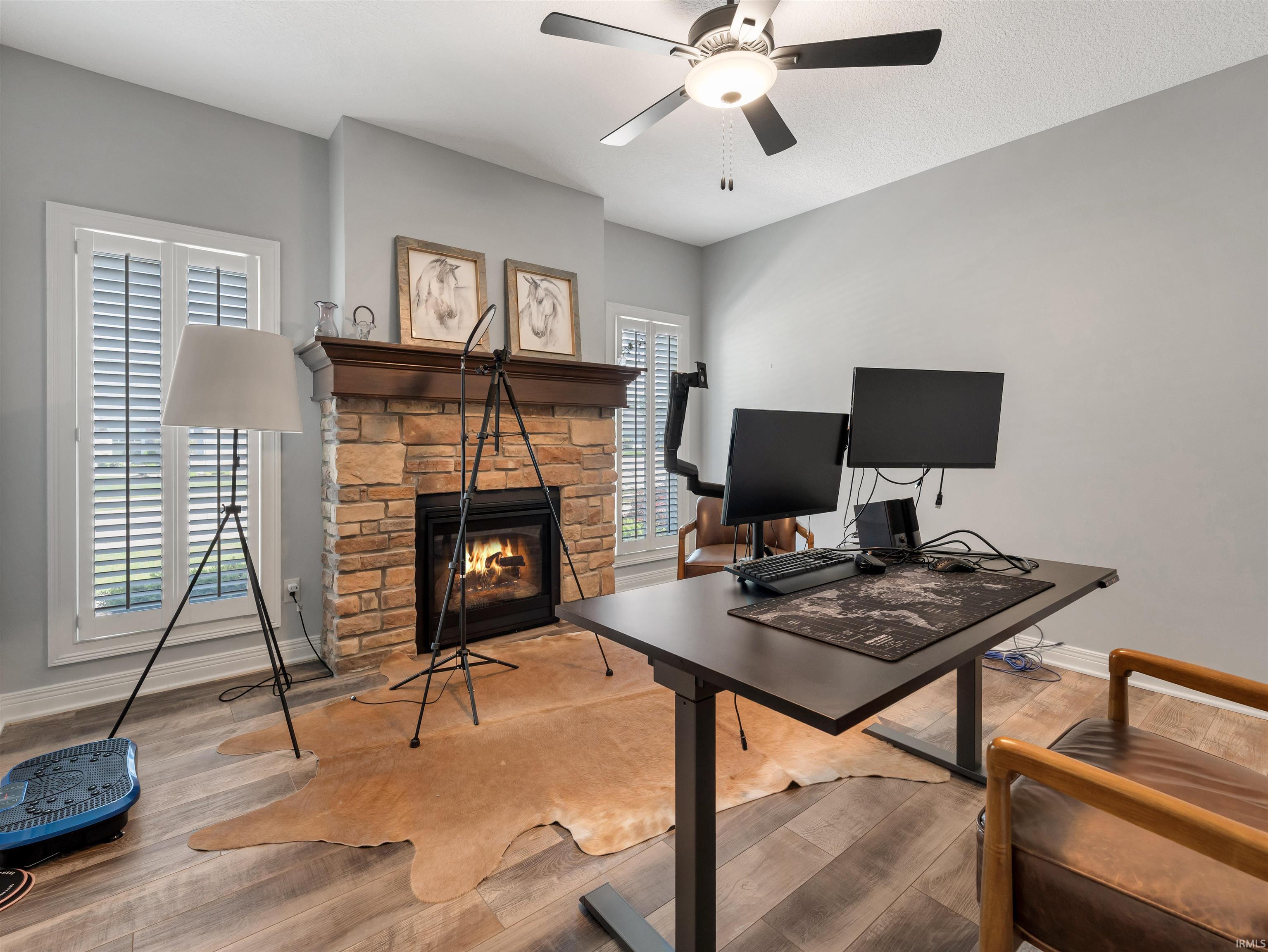 Stone-surround fireplace with a wood mantle