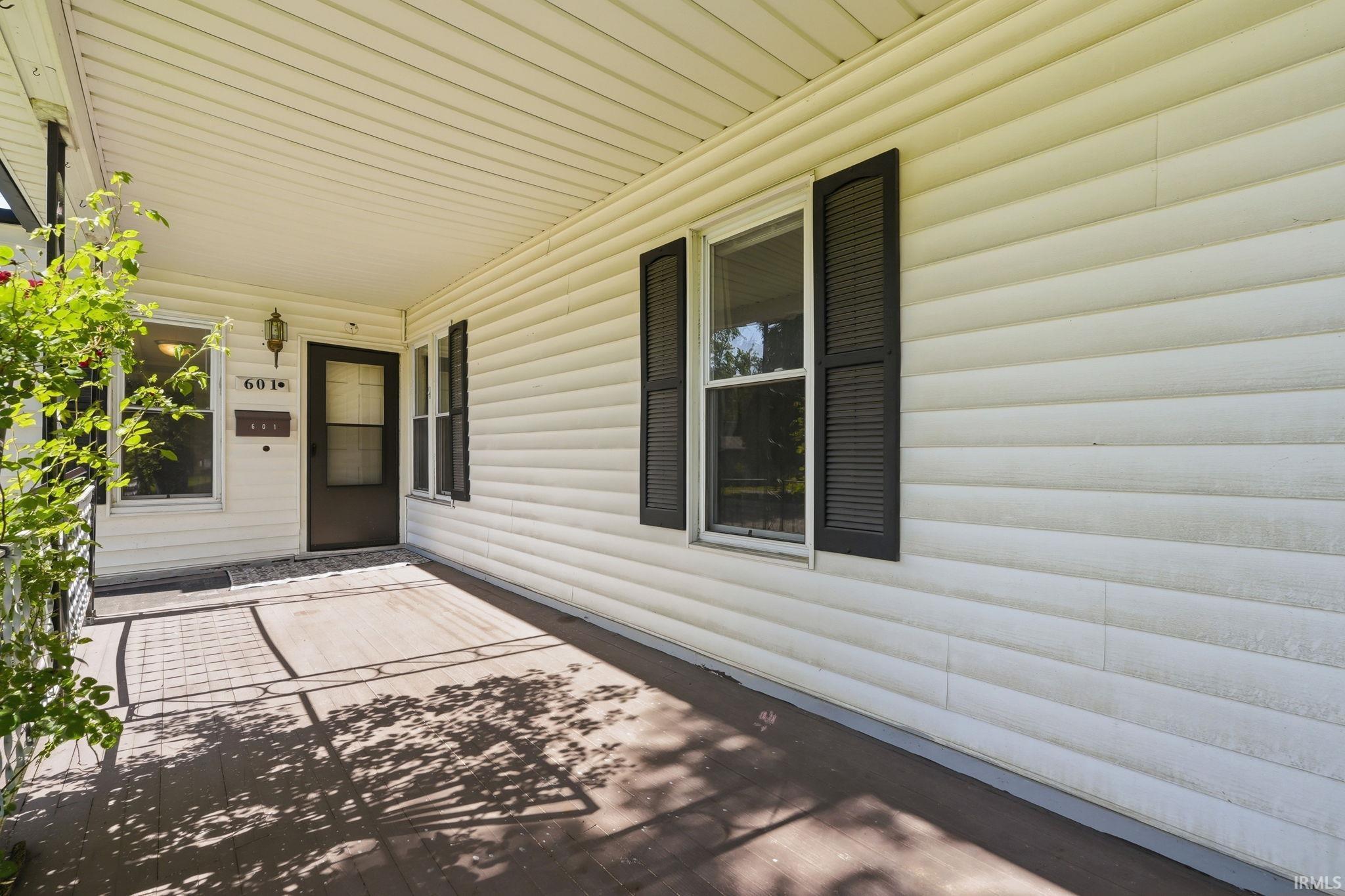Covered porch with wood-finish flooring