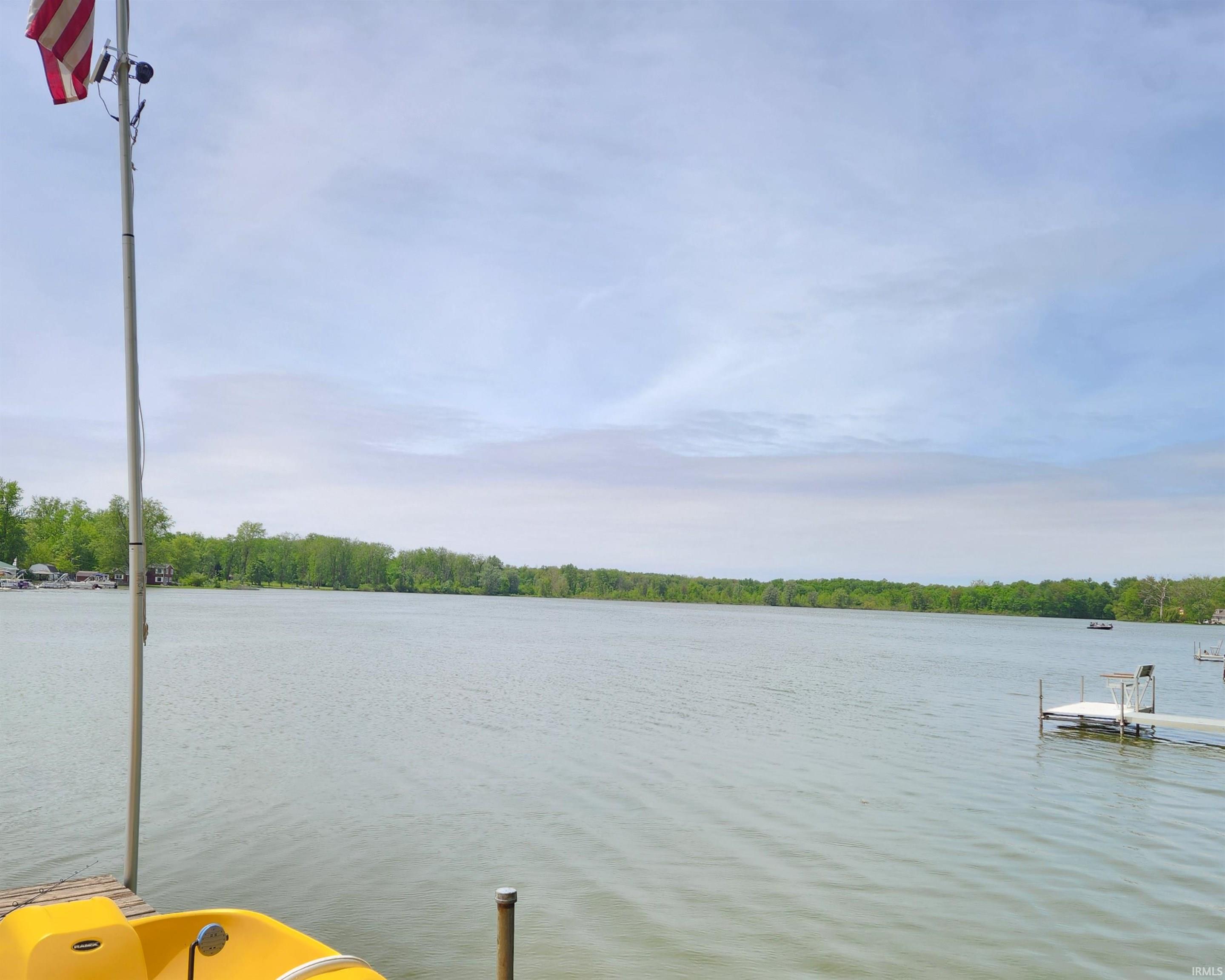 Expansive lakefront setting with a private dock