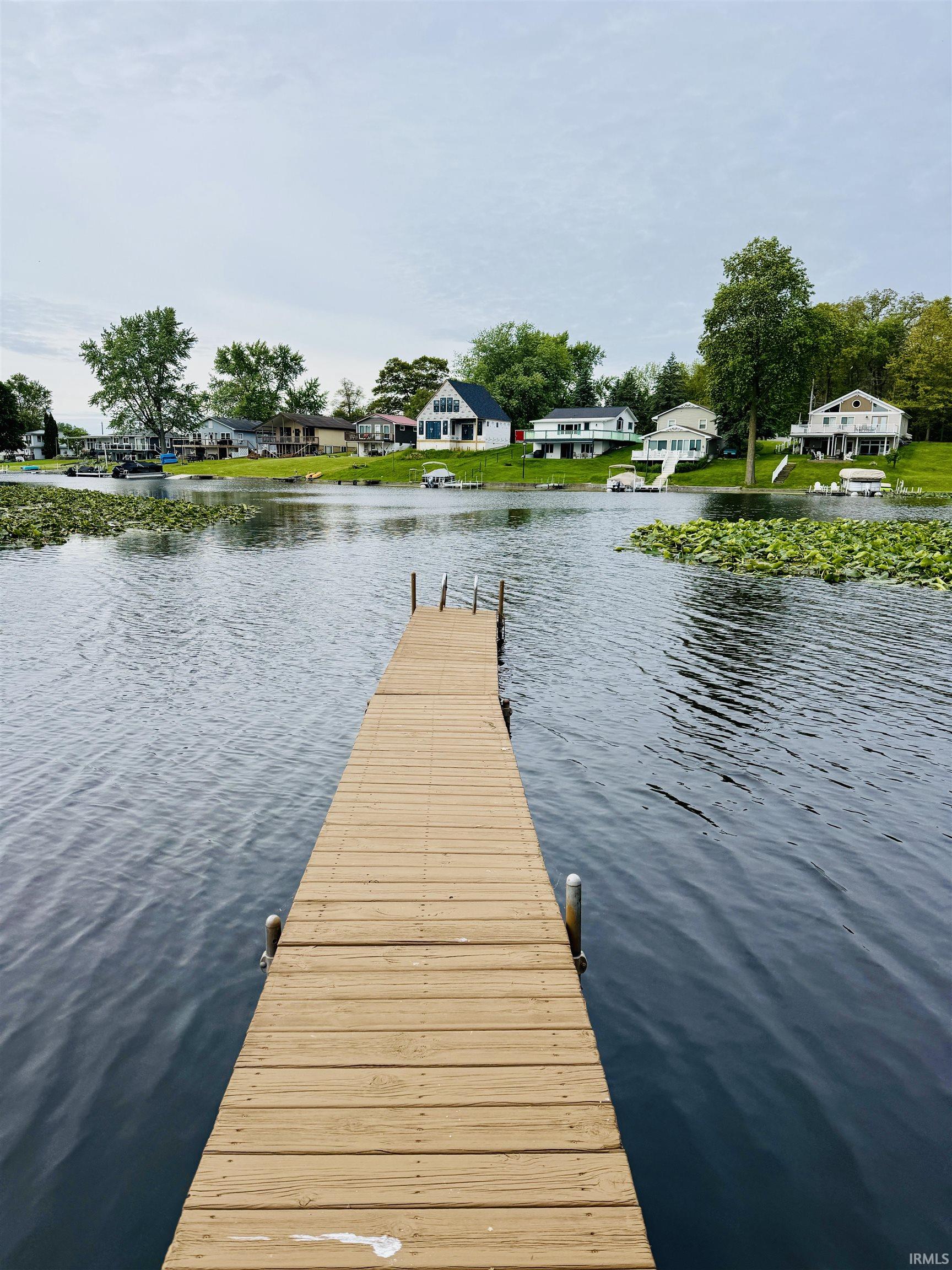 Private wooden dock extending into the water