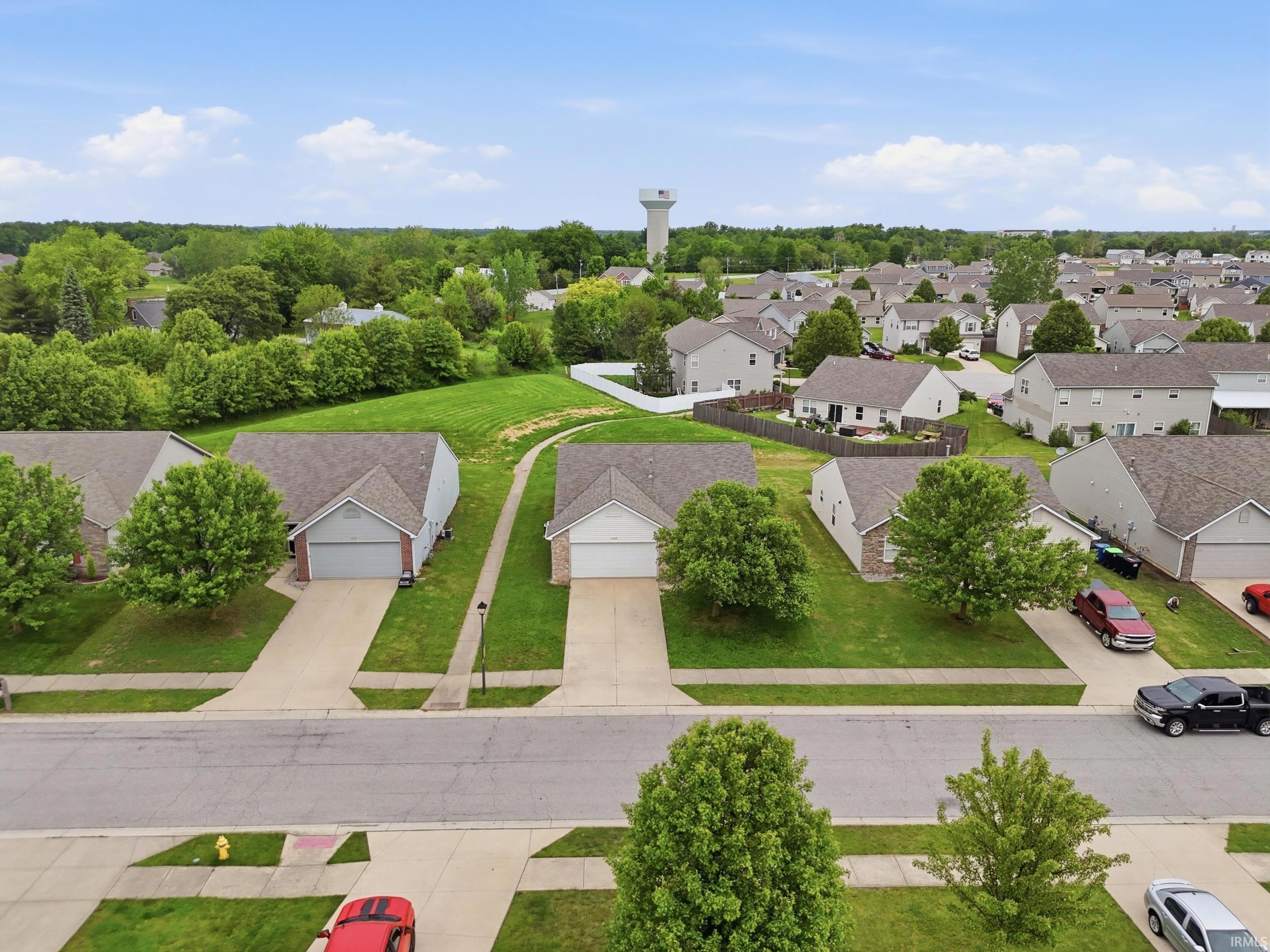 Residential neighborhood featuring uniform-style homes with attached garages