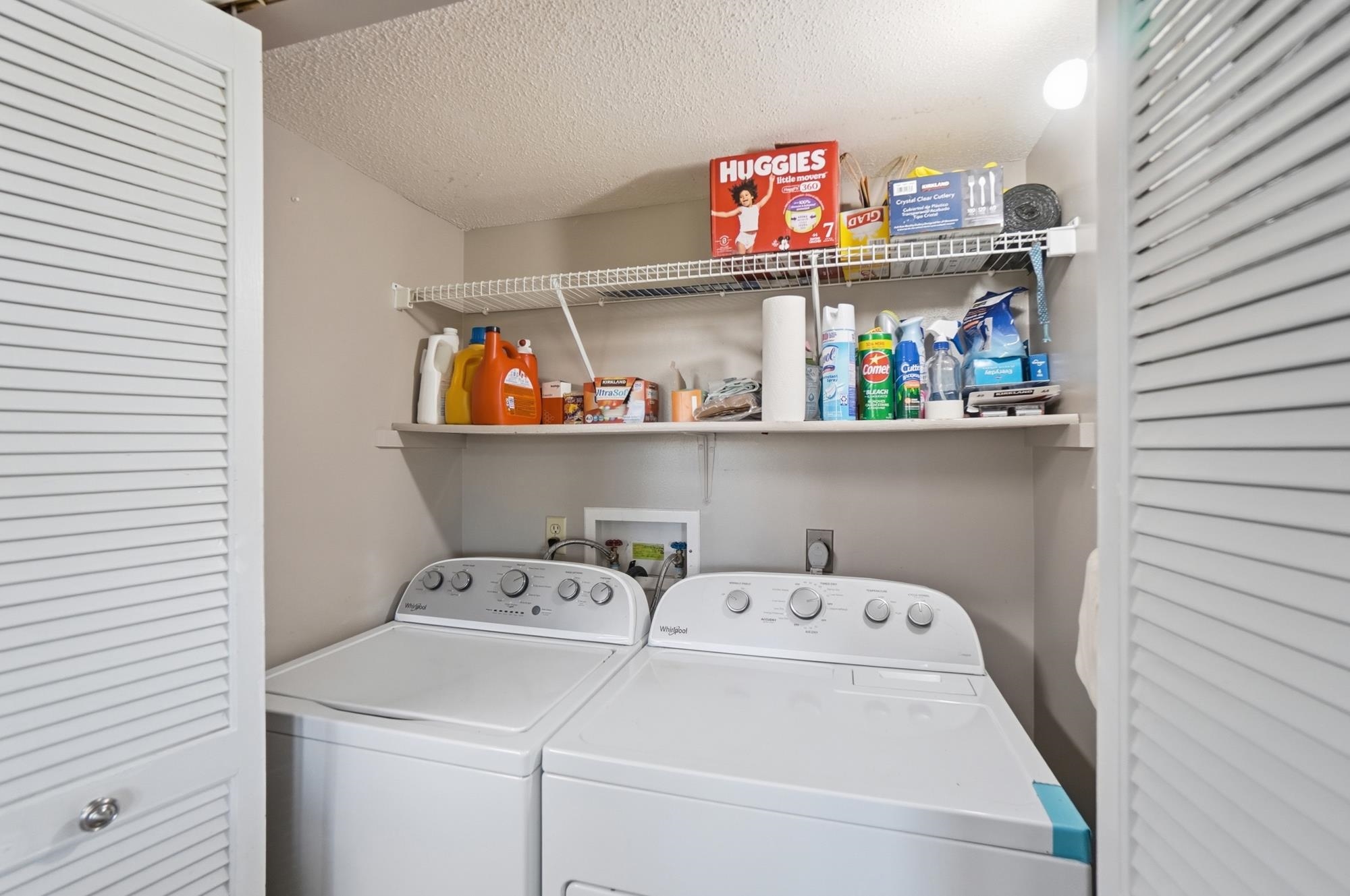 Dedicated laundry area featuring a washer and dryer