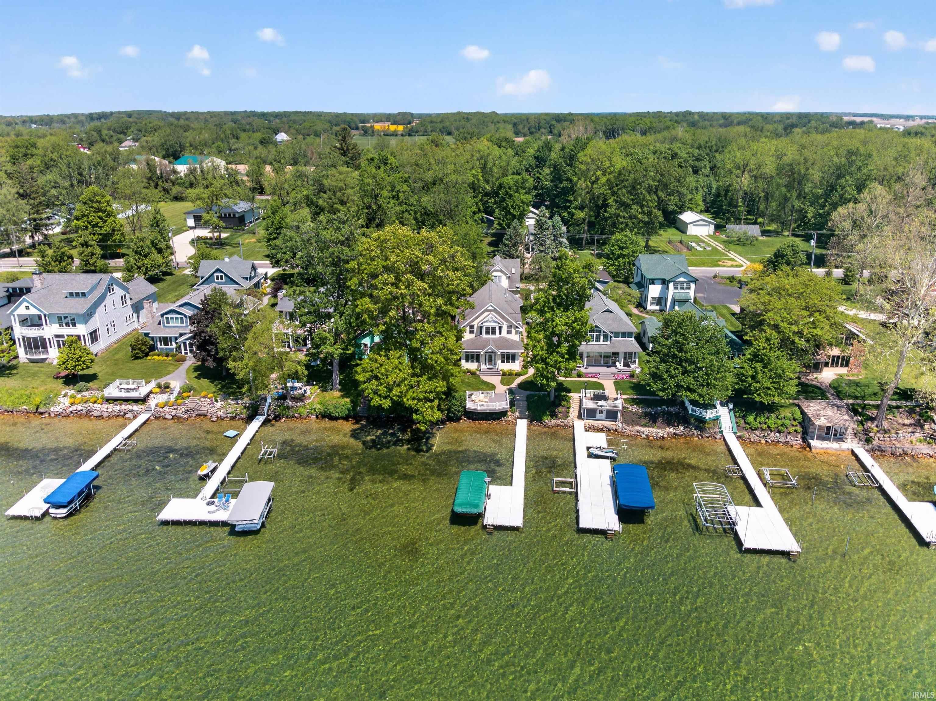 Waterfront properties featuring multiple private docks and boat lifts