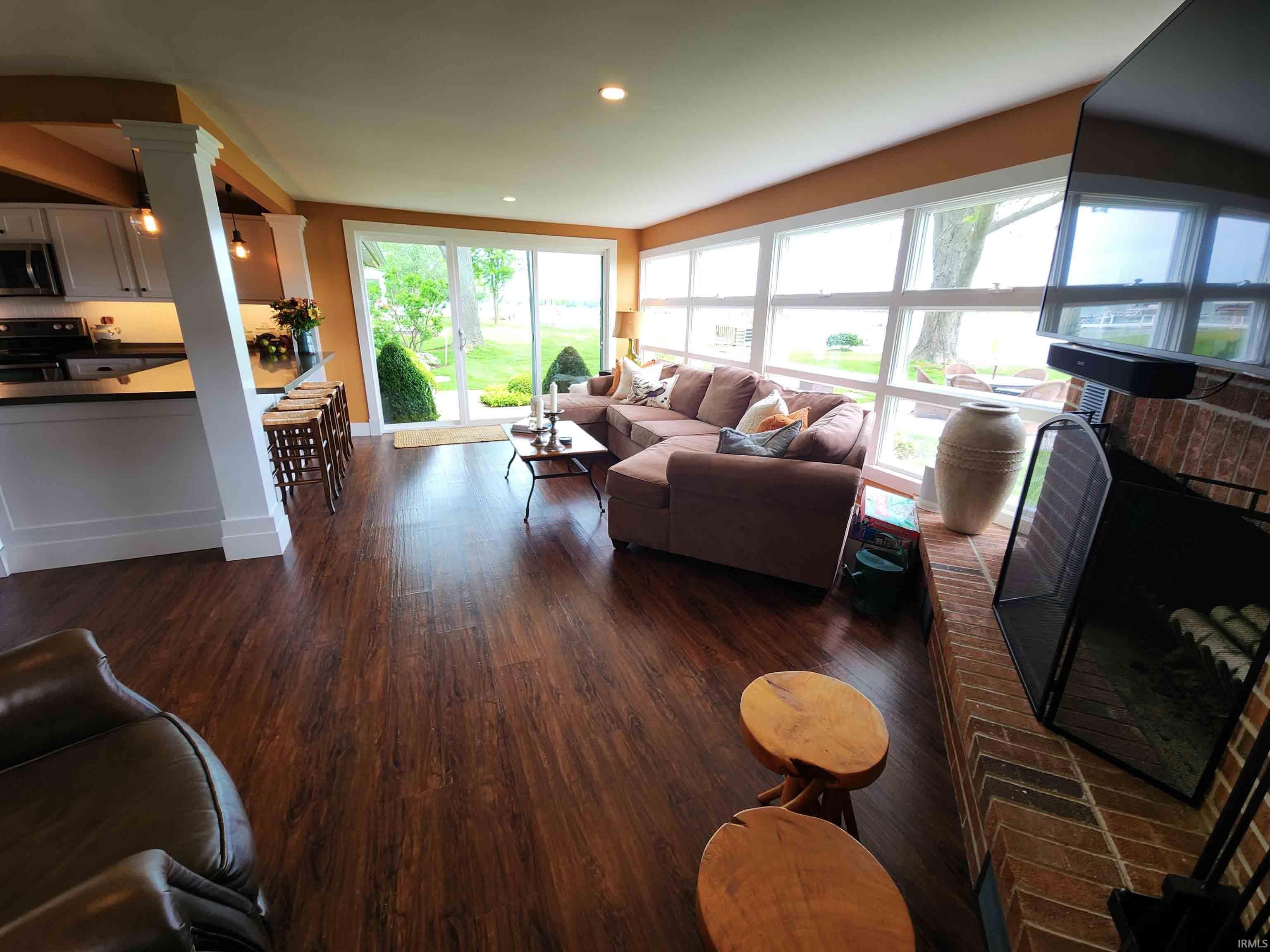 Great room with kitchen to left.