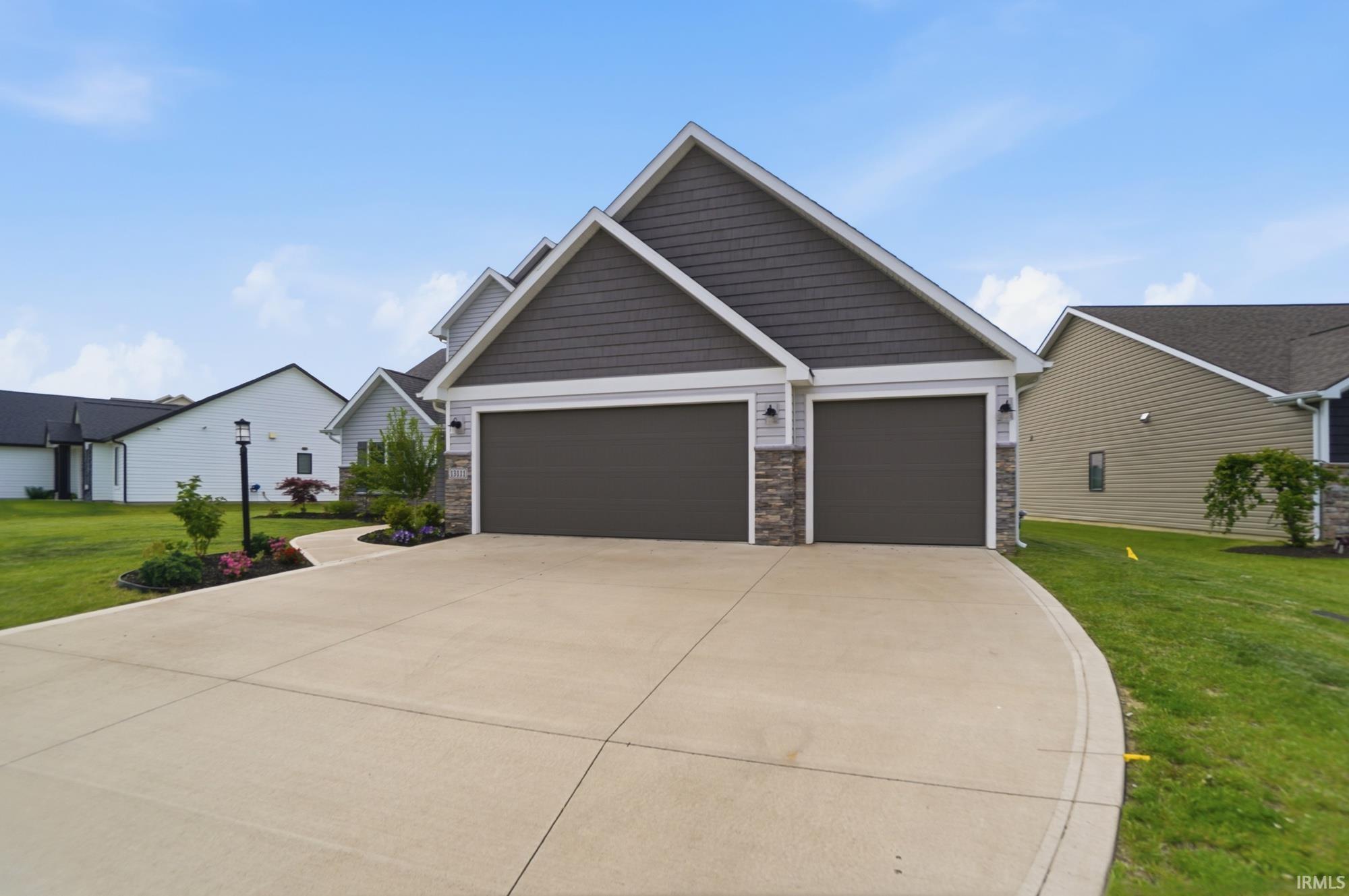 Contemporary exterior featuring horizontal siding and shake shingles