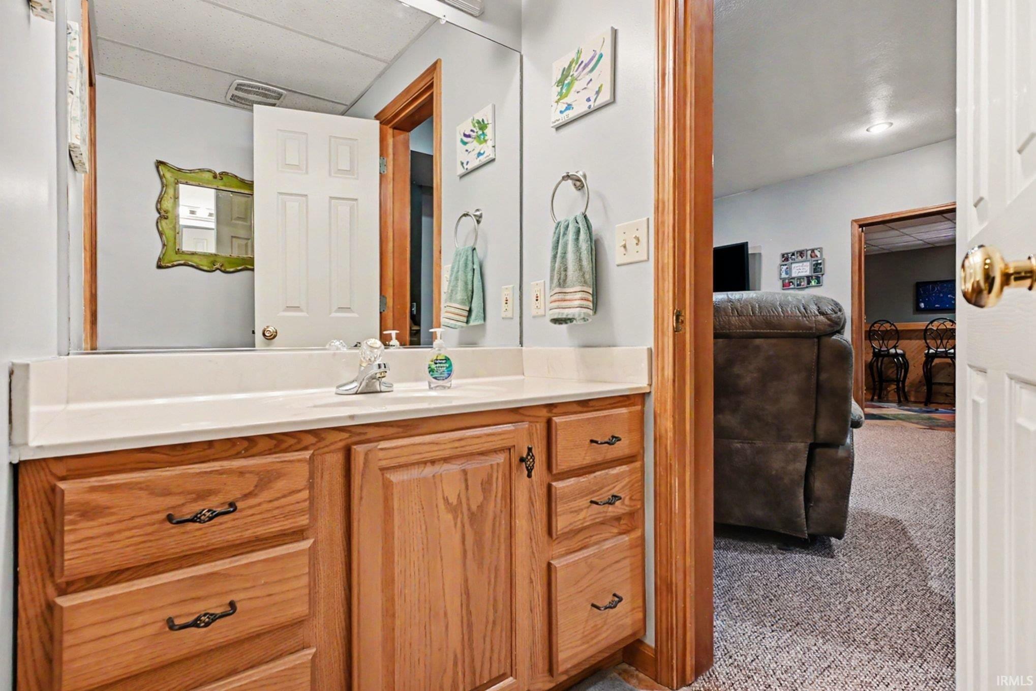 Wood-finish vanity with ample storage