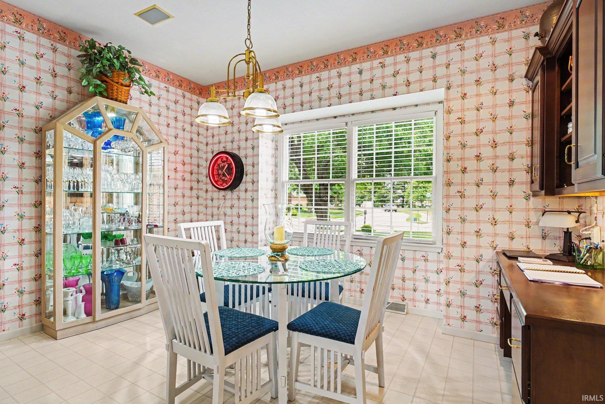 Eat-in kitchen area with built in office space