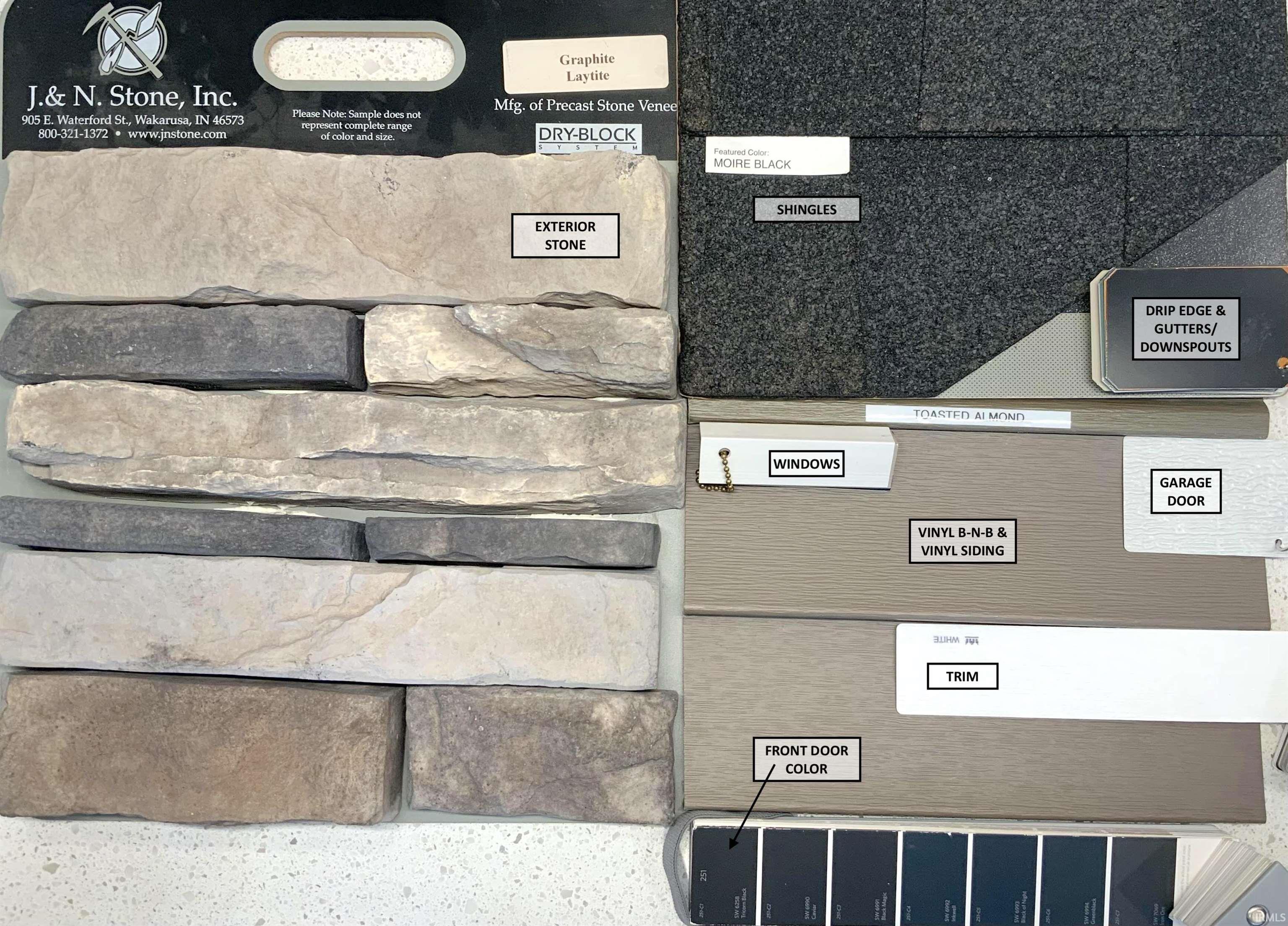 Exterior material selections featuring a multi-tone stone veneer and complementary vinyl siding