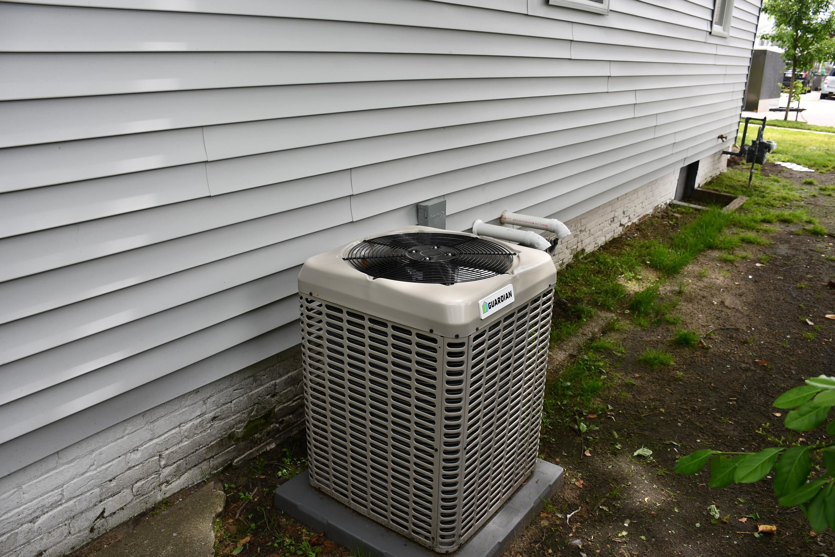 Guardian air conditioning unit on a concrete pad