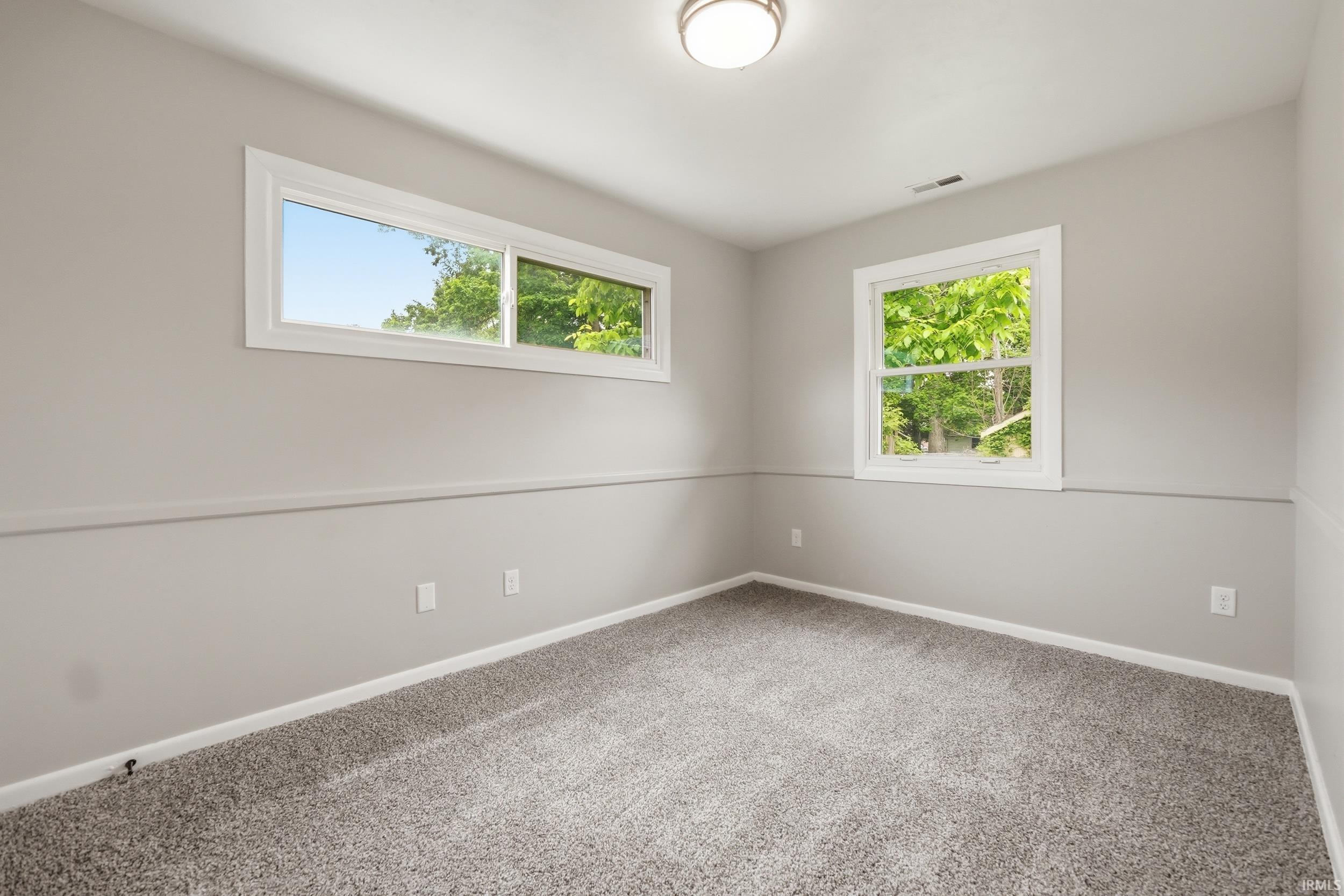 Light gray carpet flooring