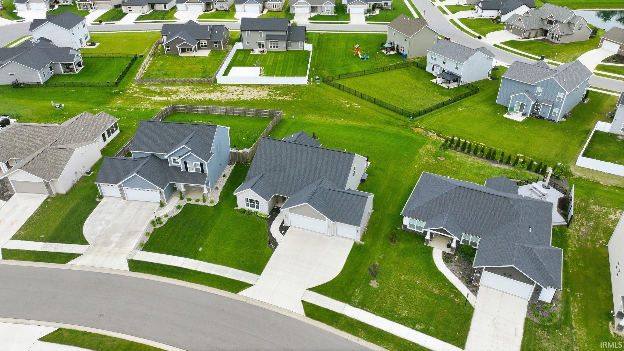 New construction development featuring single-family homes with uniform lot sizes