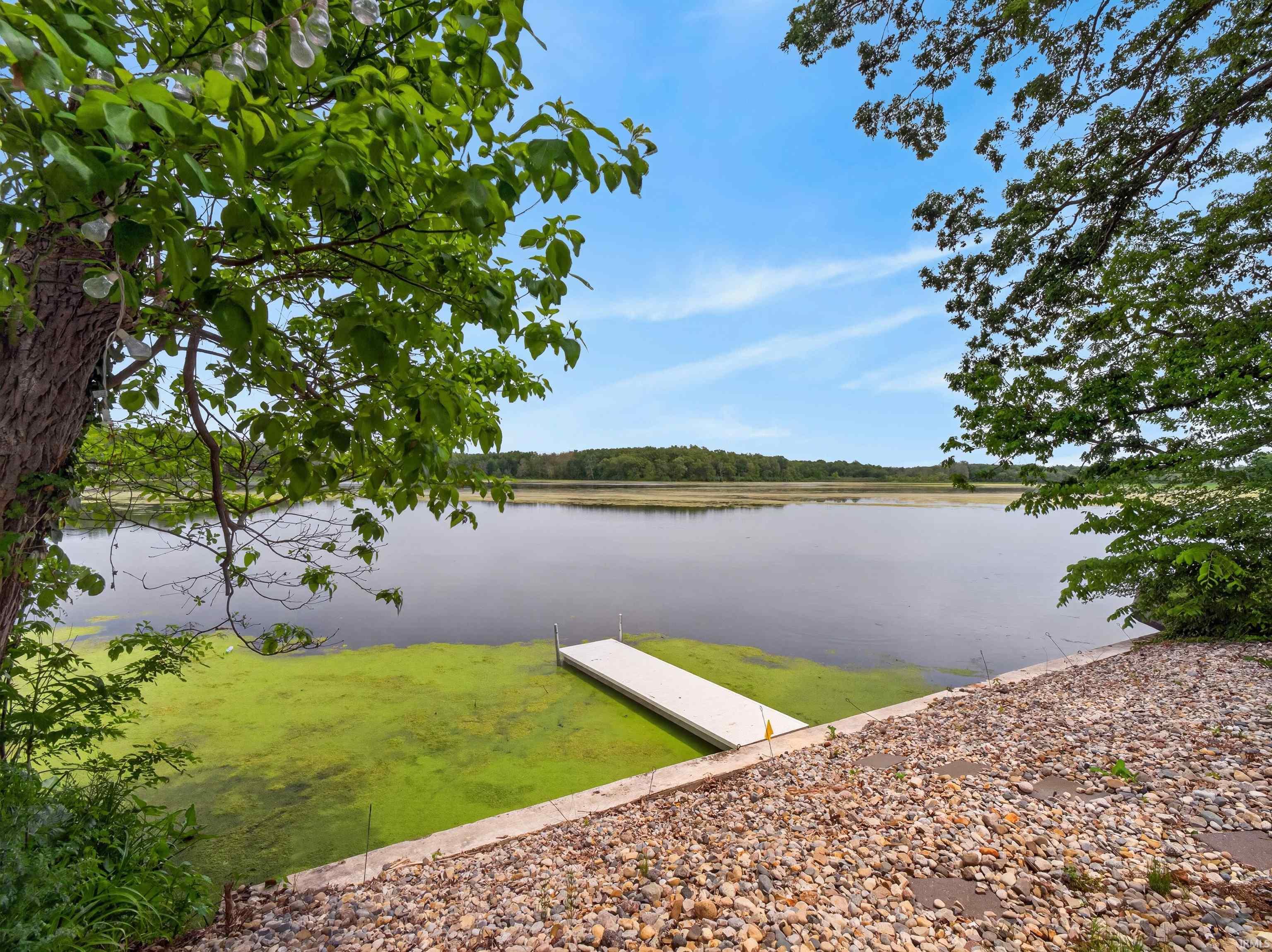 Waterfront access with a private dock and a gravel shoreline