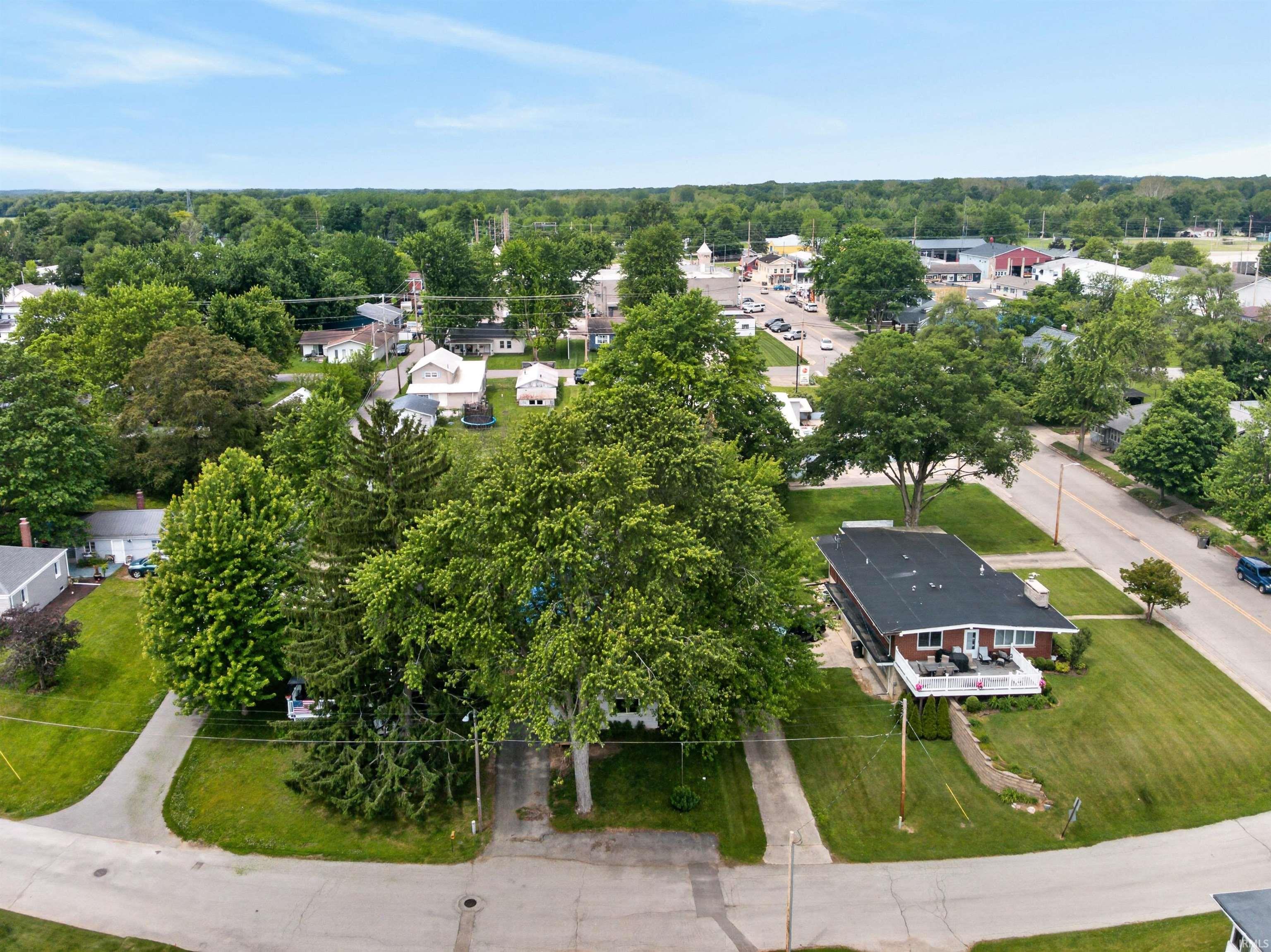 Neighborhood setting with tree-lined streets and established homes