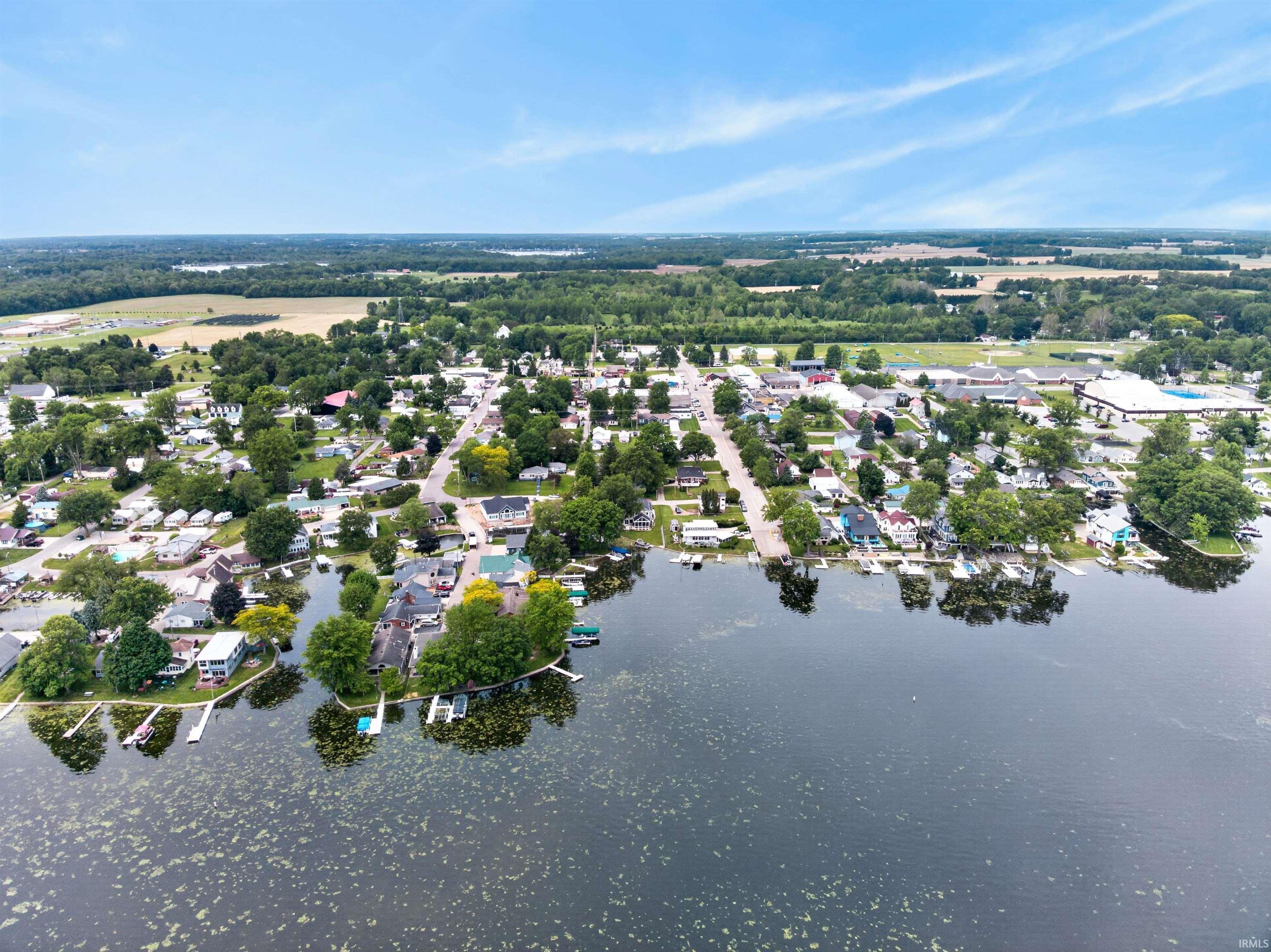 Waterfront community featuring residential properties with direct lake access and private docks