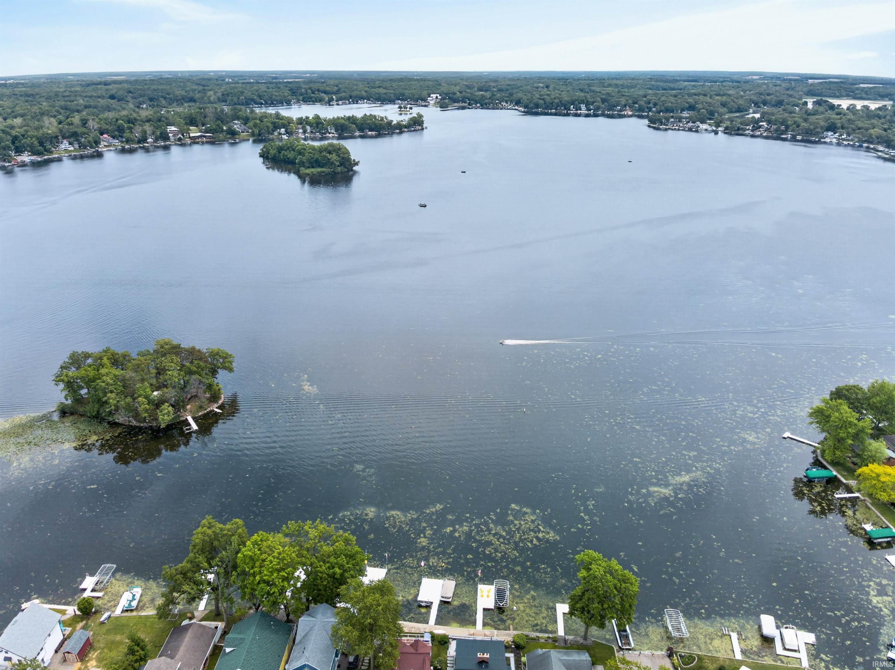 Expansive lakefront setting with multiple docks and private boat launches