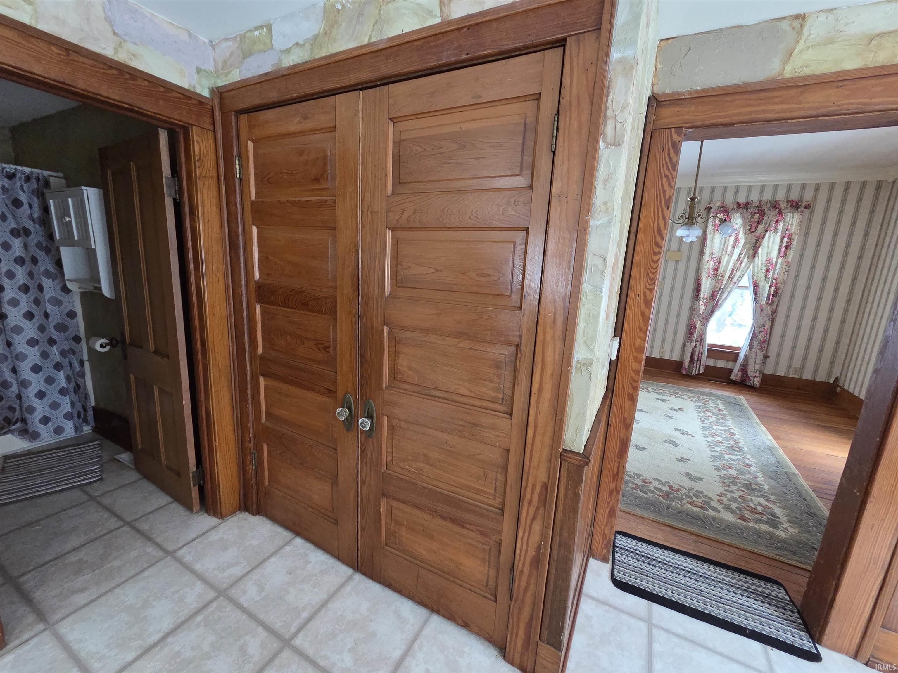 Detailed view of wallpapered walls