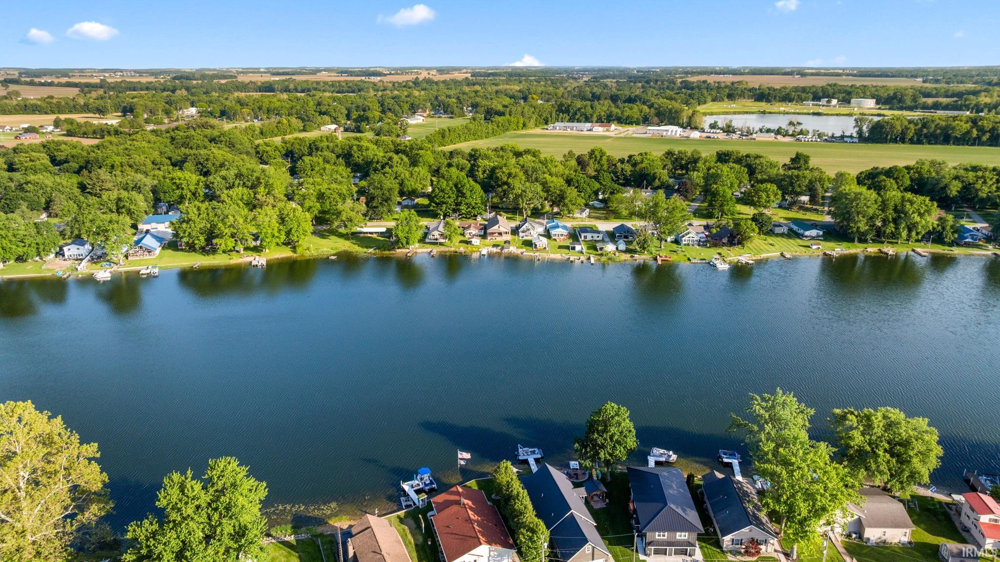 Waterfront homes featuring private docks on a serene lake