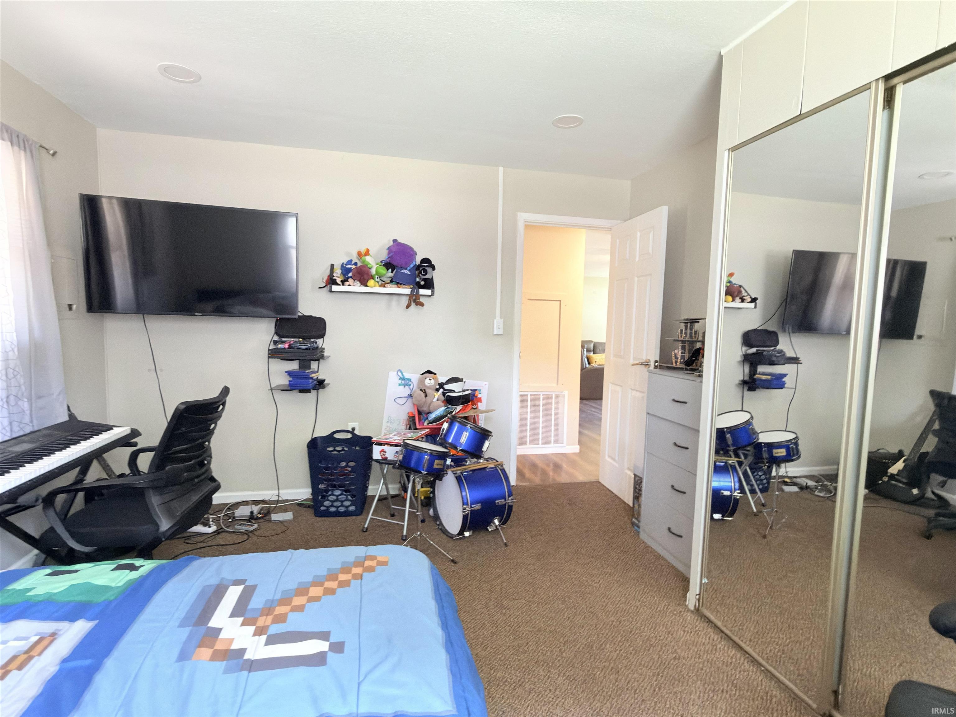 Bedroom featuring recessed lighting, a neutral wall color, and carpeted flooring