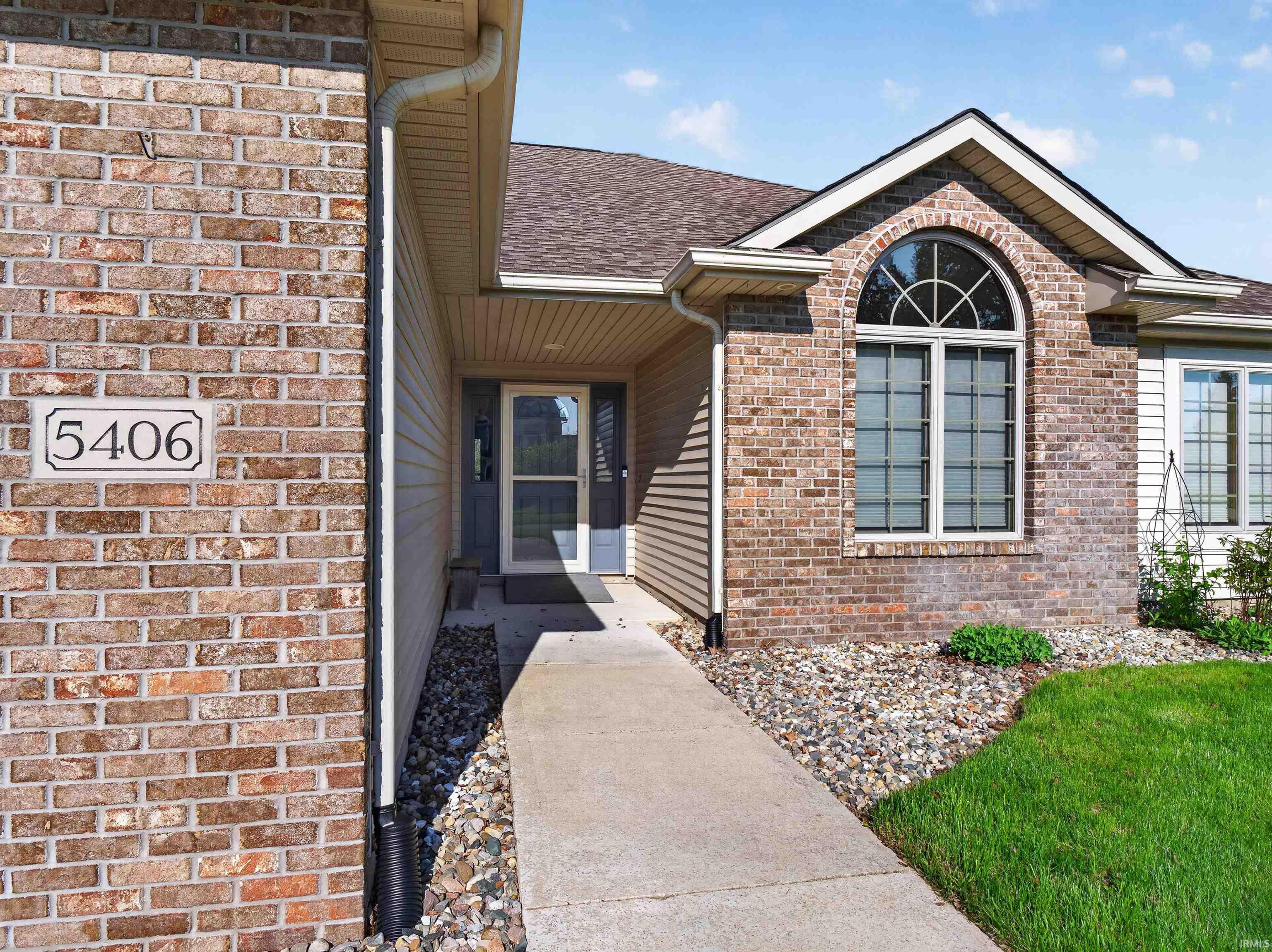 CUSTOM STORM DOOR, RING DOOR BELL AND SECURITY IN BACK INCLUDED.