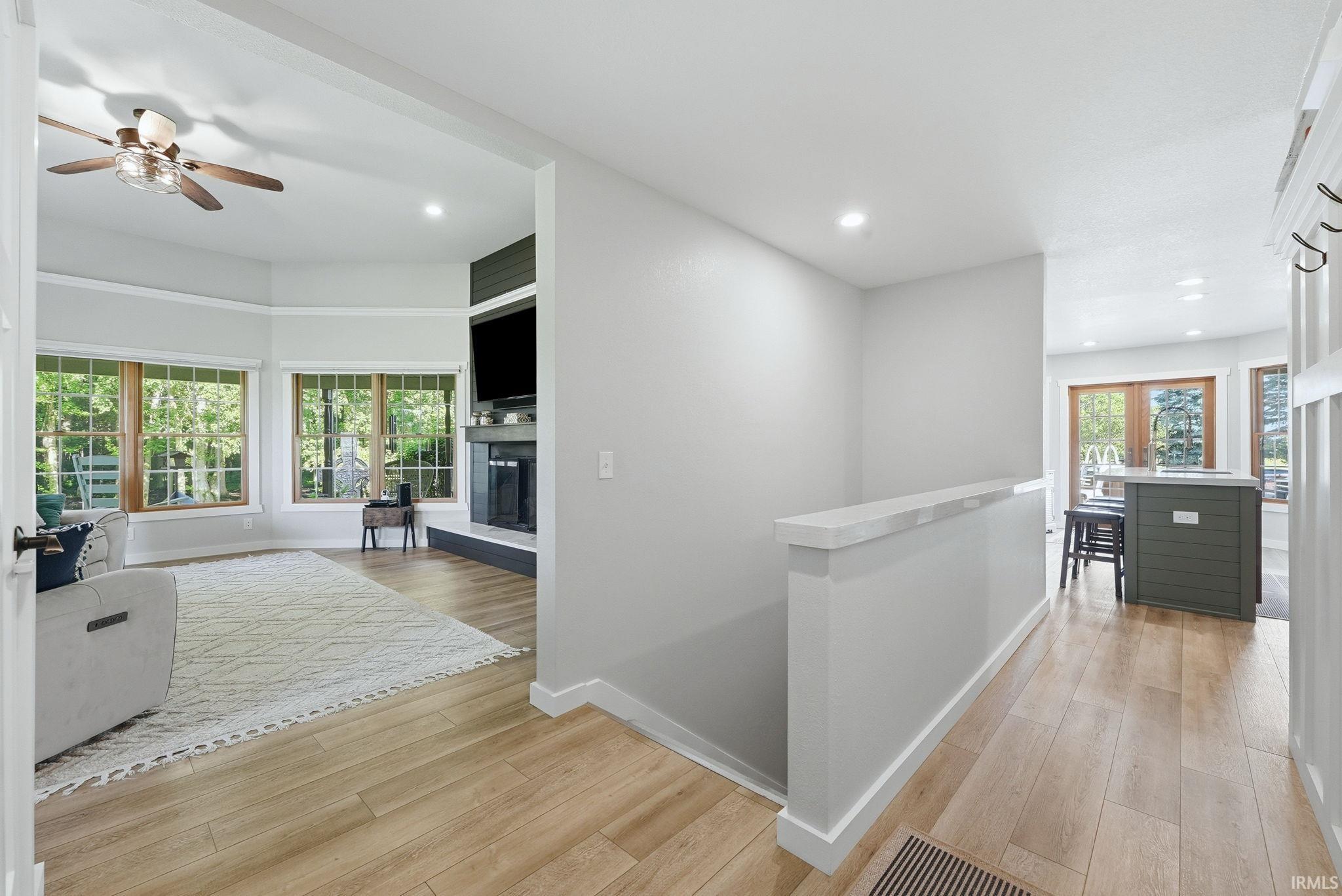 Spacious interior with wood-finish flooring throughout