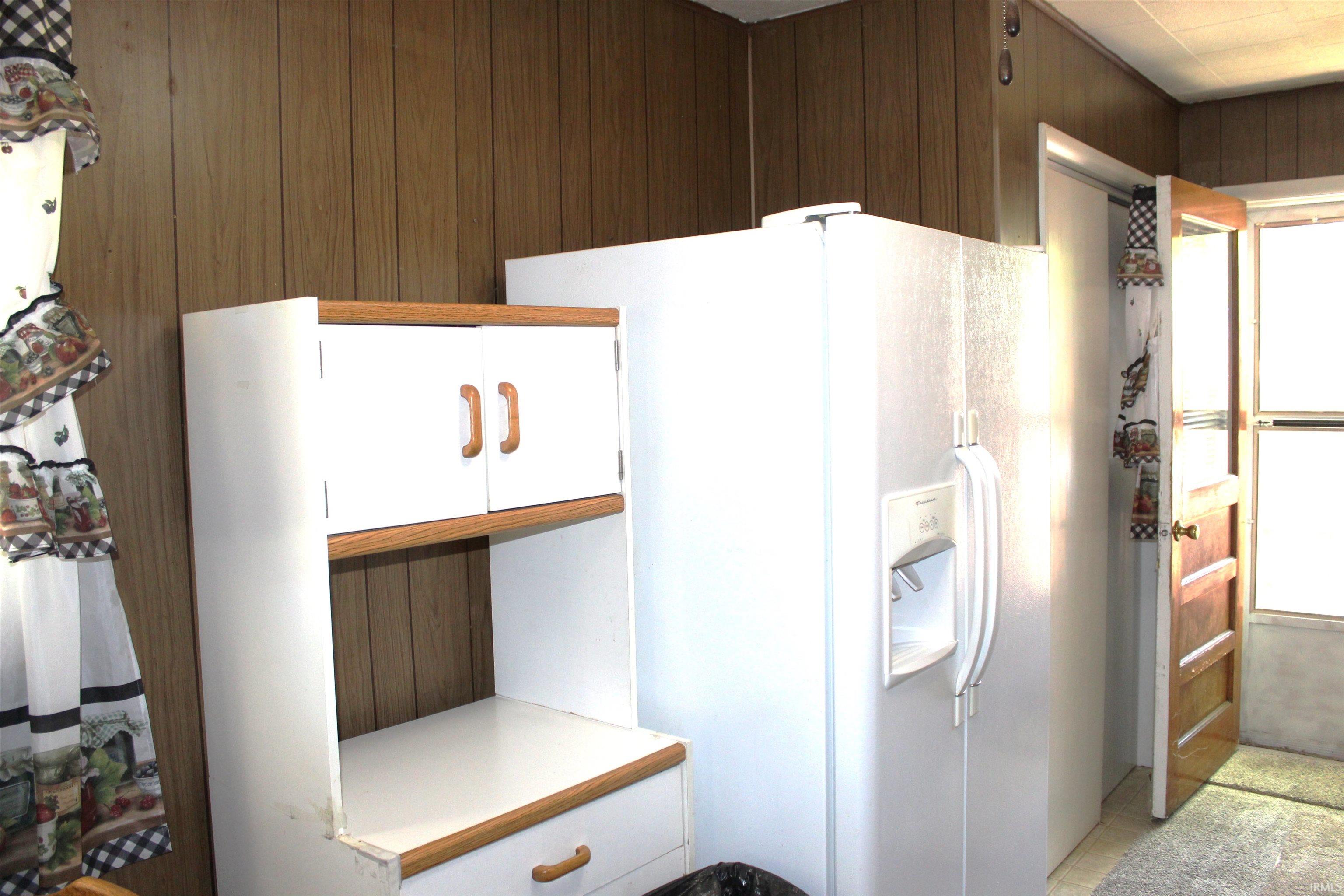 Light-colored wood paneling throughout