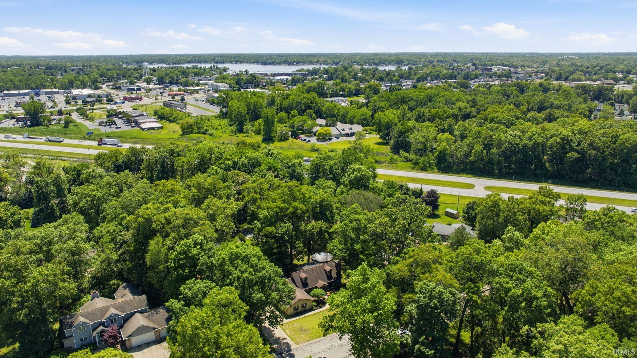 Expansive green landscape featuring mature trees